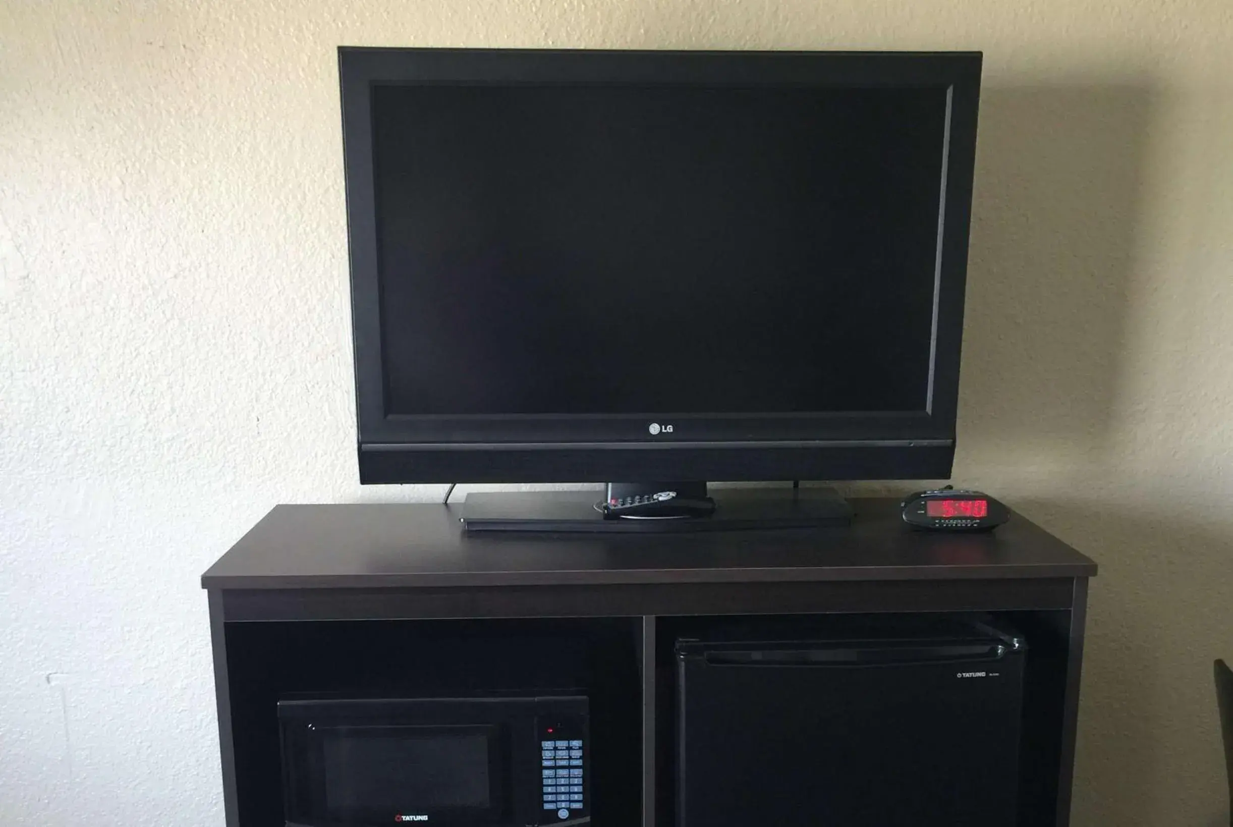 Photo of the whole room, TV/Entertainment Center in Super 8 by Wyndham Florence