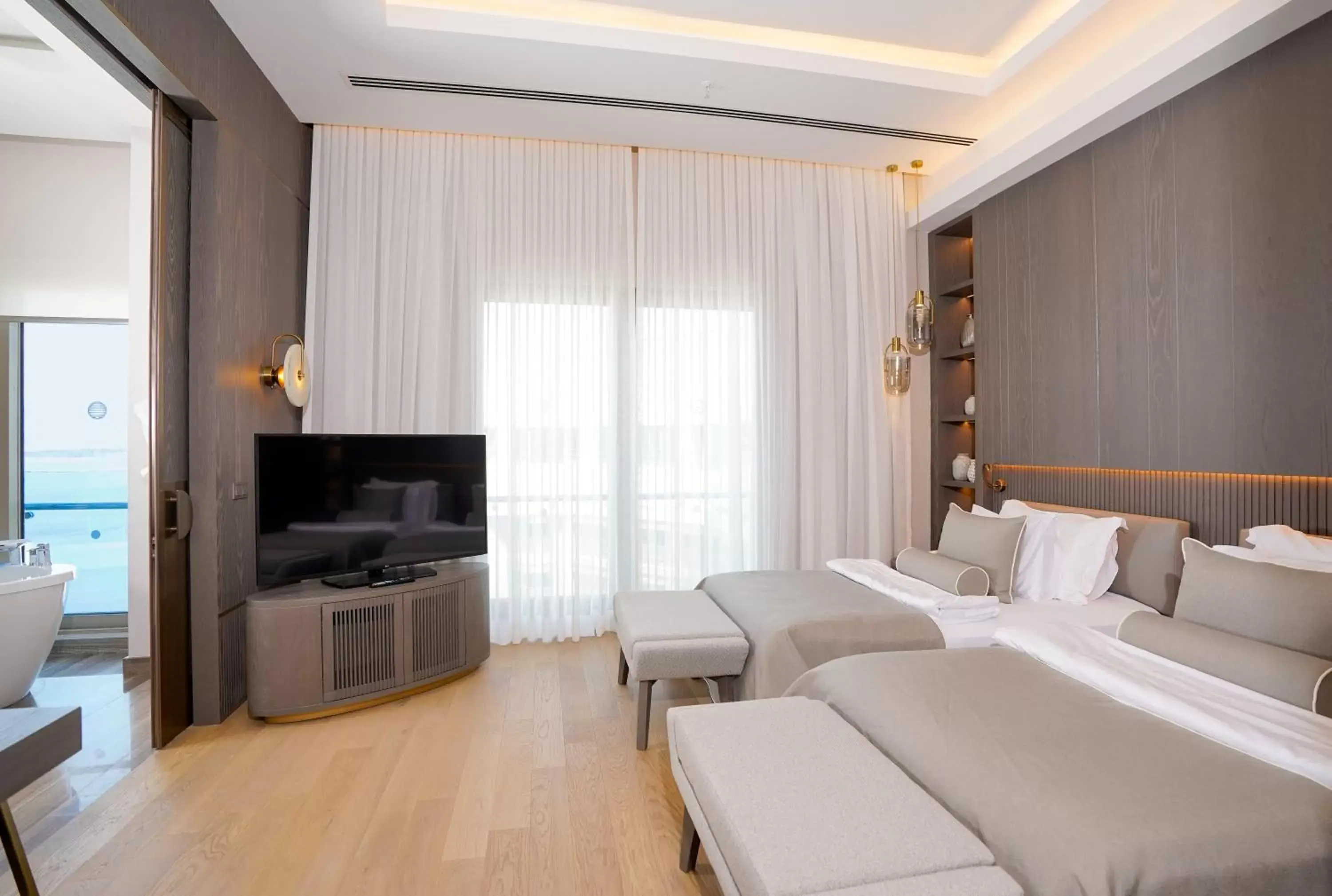 Photo of the whole room, TV/Entertainment Center in Akra Hotel