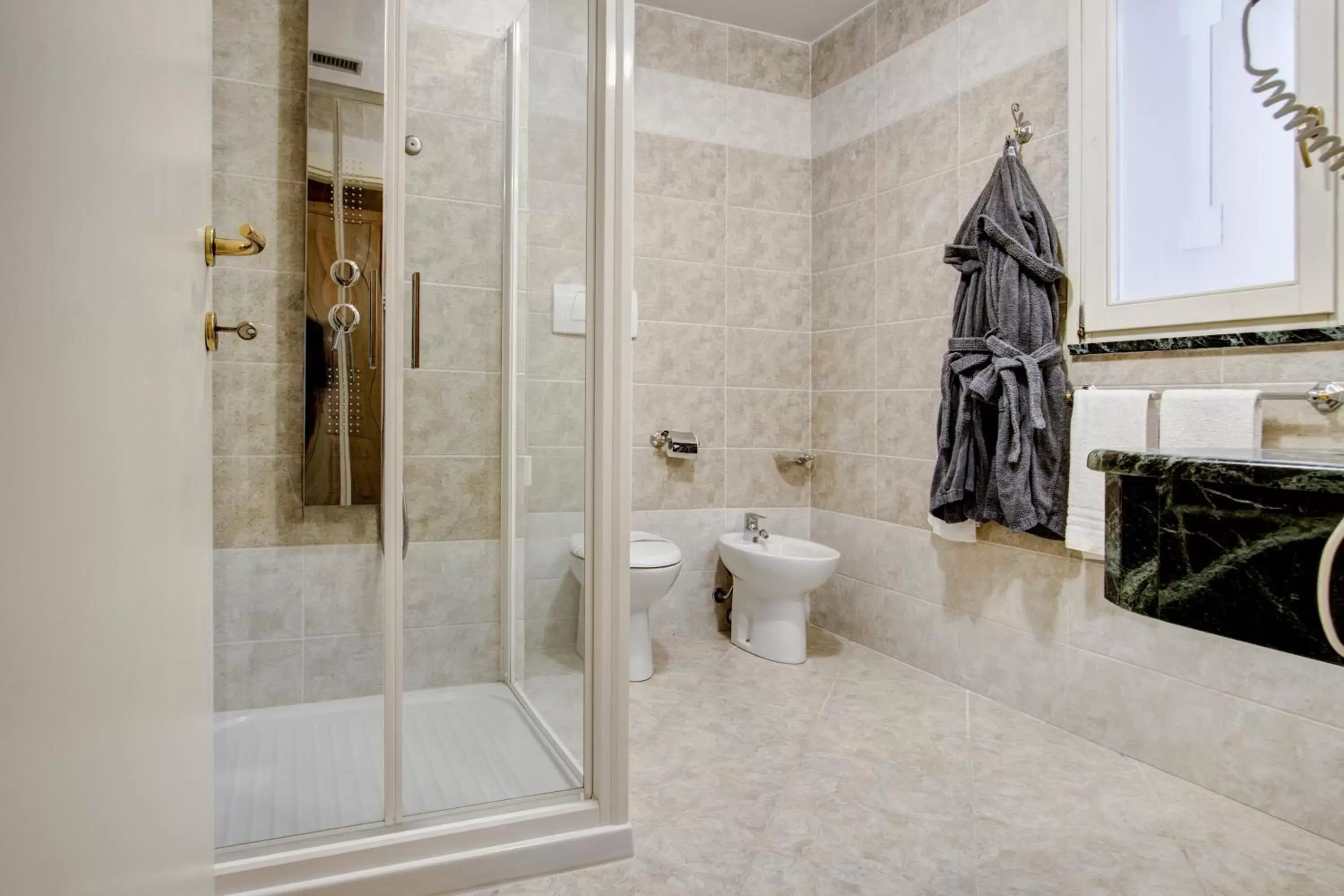 Bathroom in Hotel La Locanda