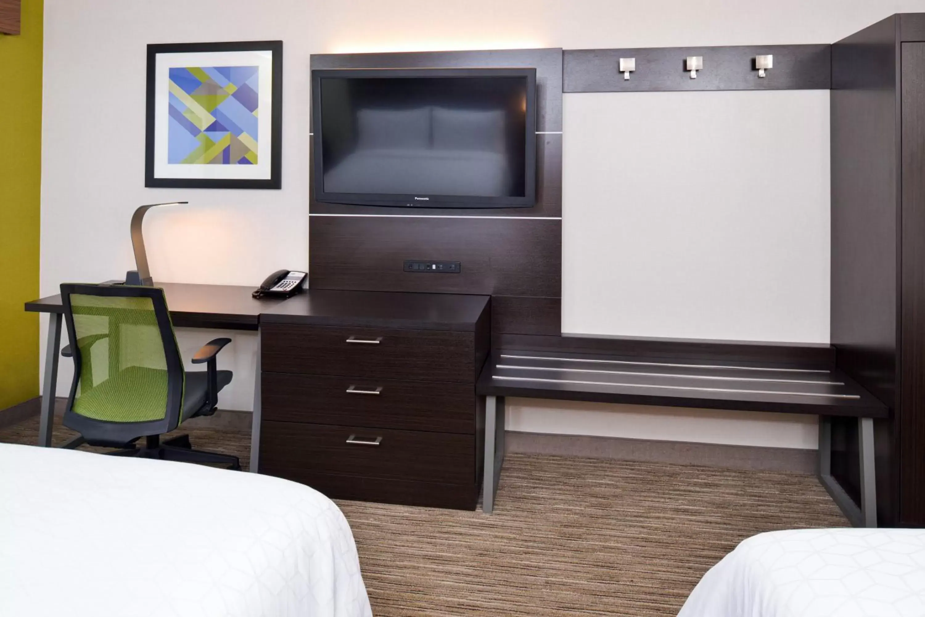 Photo of the whole room, TV/Entertainment Center in Holiday Inn Express Wixom, an IHG Hotel