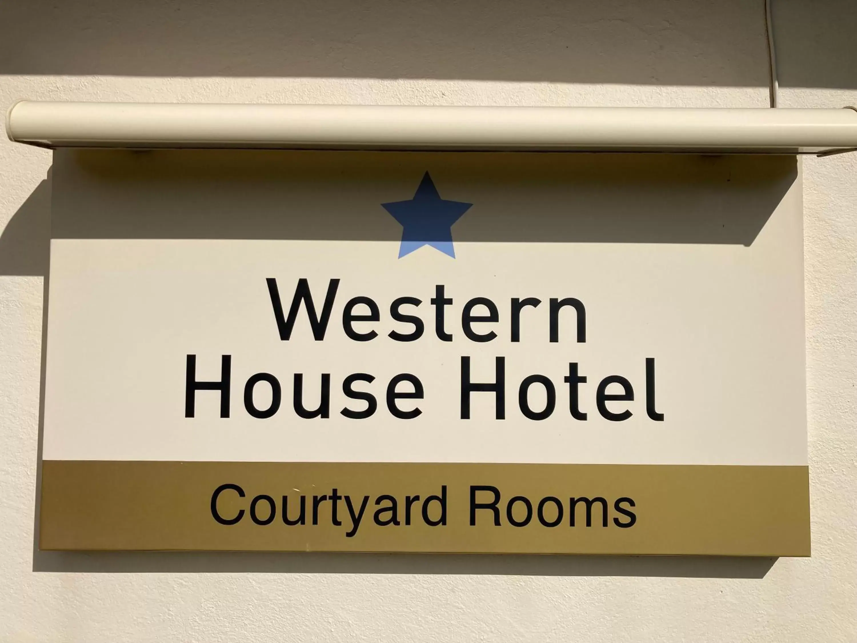 Property logo or sign in Western House Hotel
