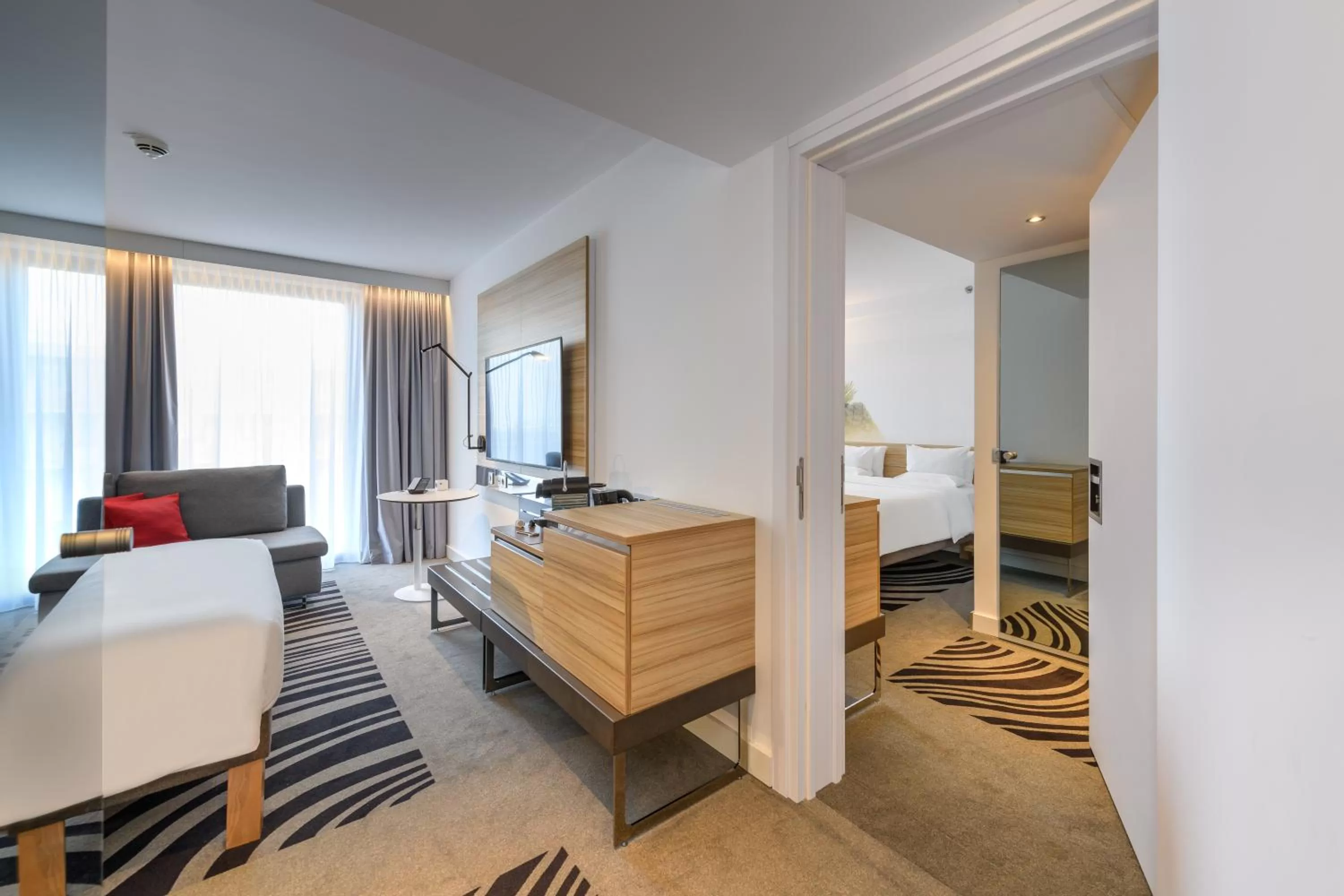 Photo of the whole room, Bed in Novotel Wien Hauptbahnhof