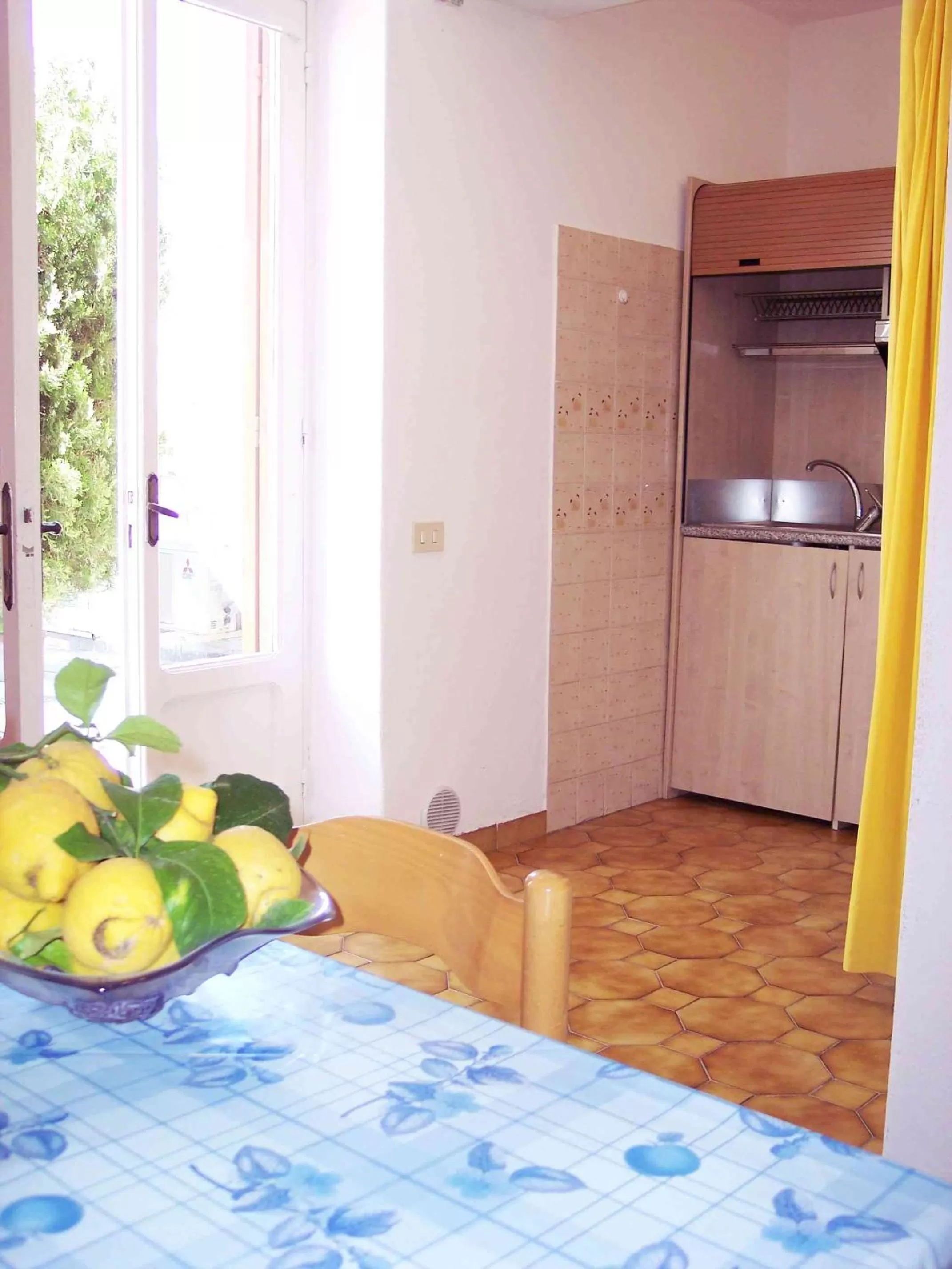 Kitchen or kitchenette, Bed in Aparthotel Villa Marinù