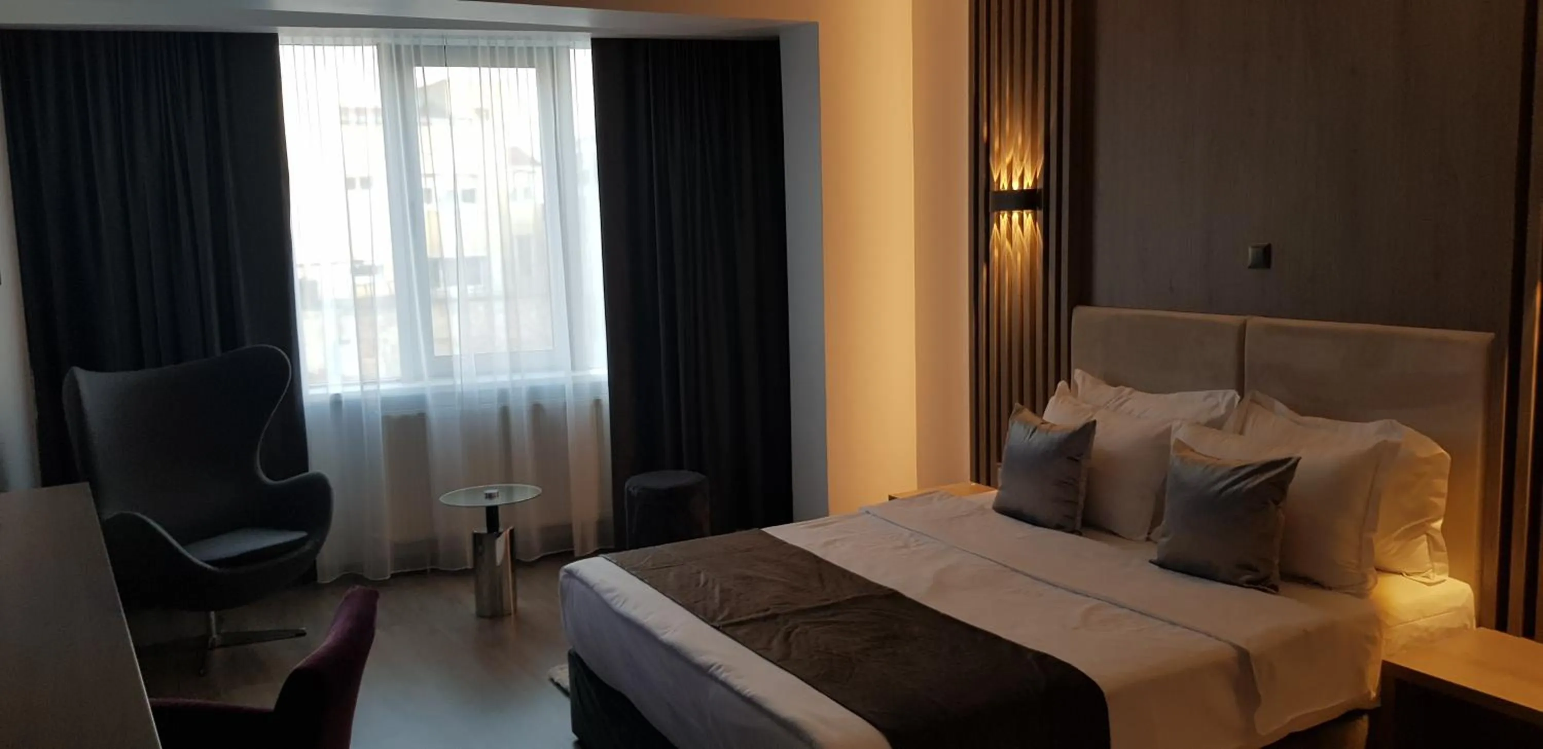 Seating area, Bed in Unique Boutique