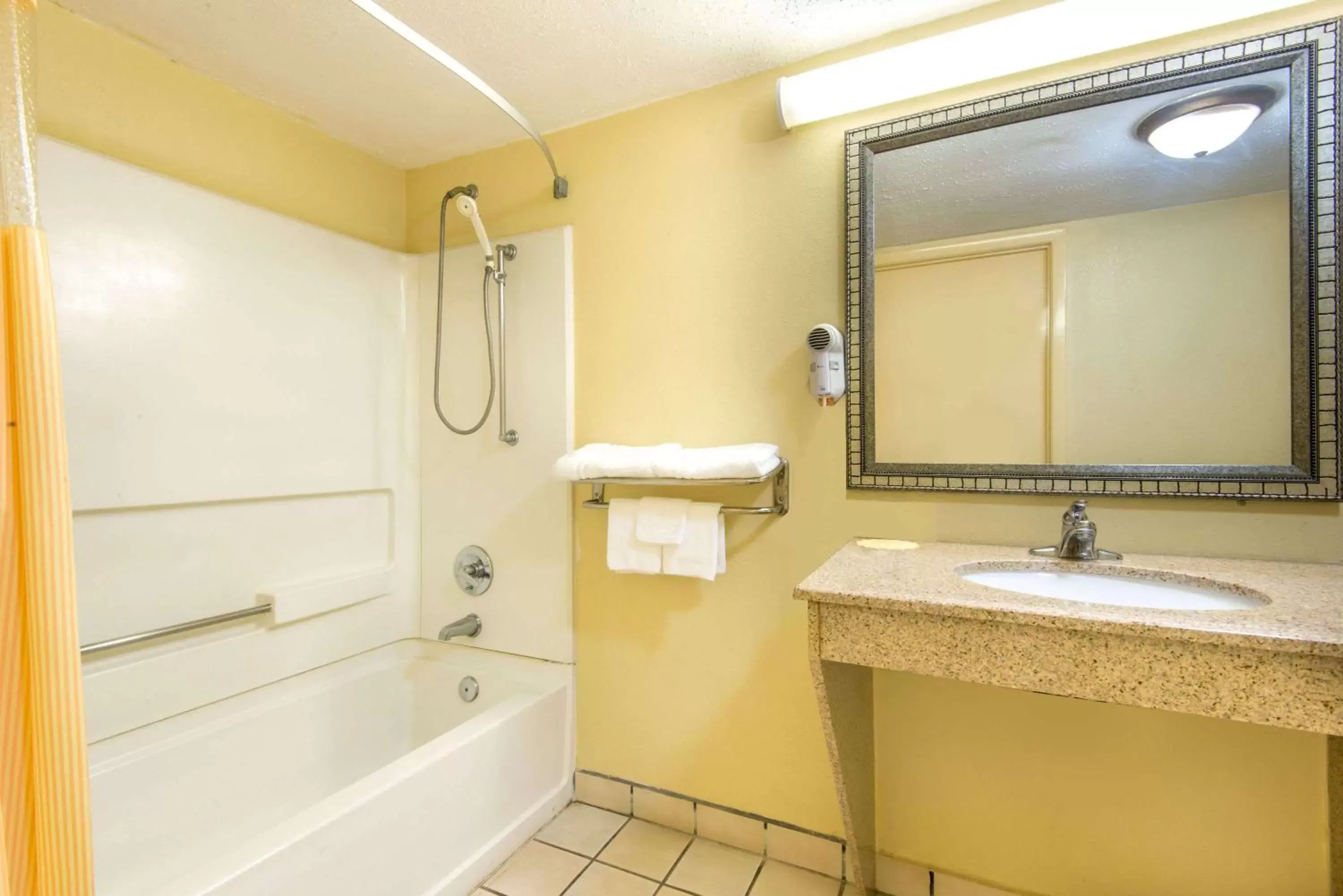 Bathroom in Days Inn by Wyndham Shorter