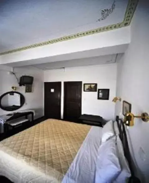 Bed in Acropolis Hotel