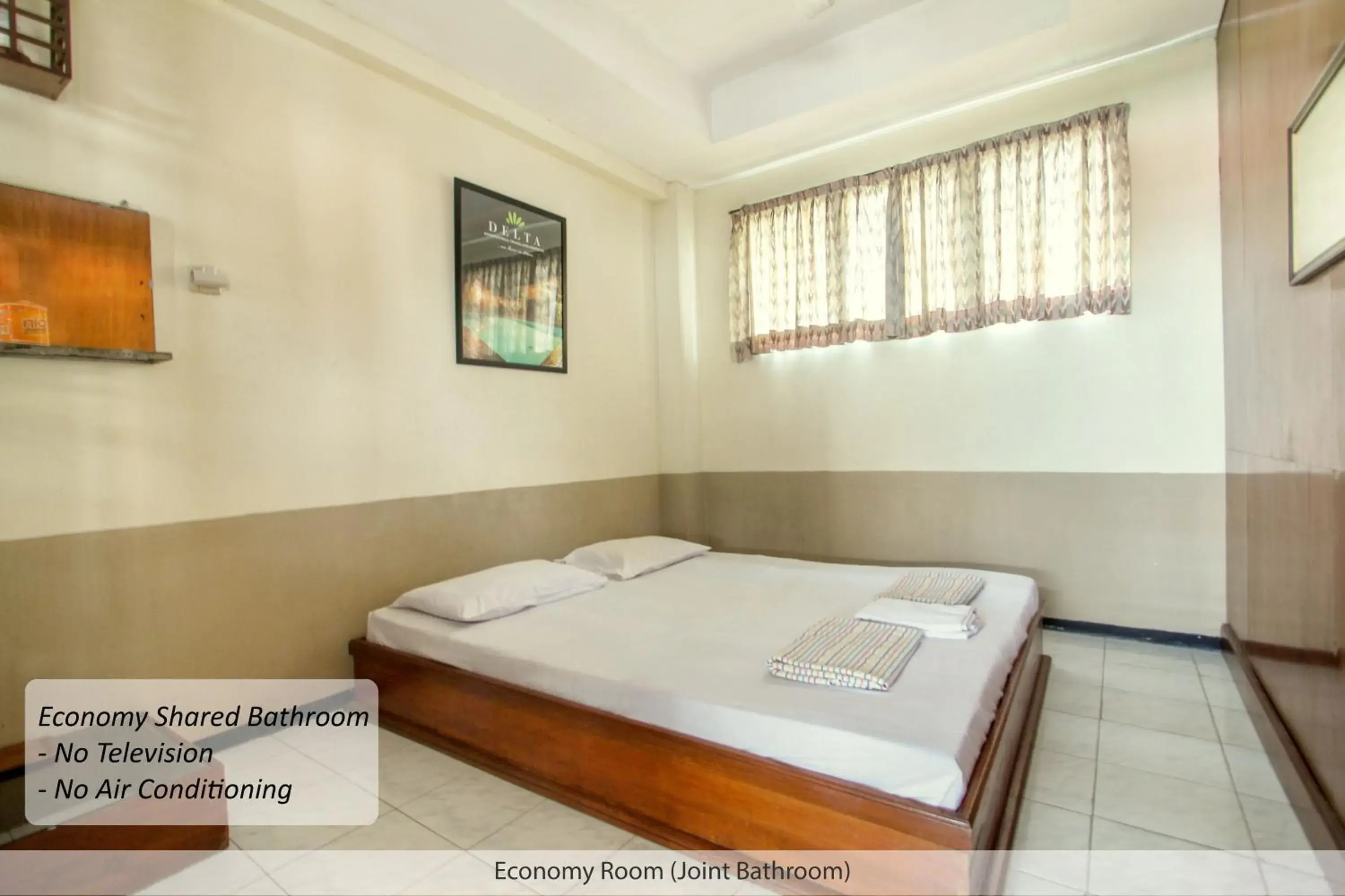 Seating area, Bed in Duta Guest House