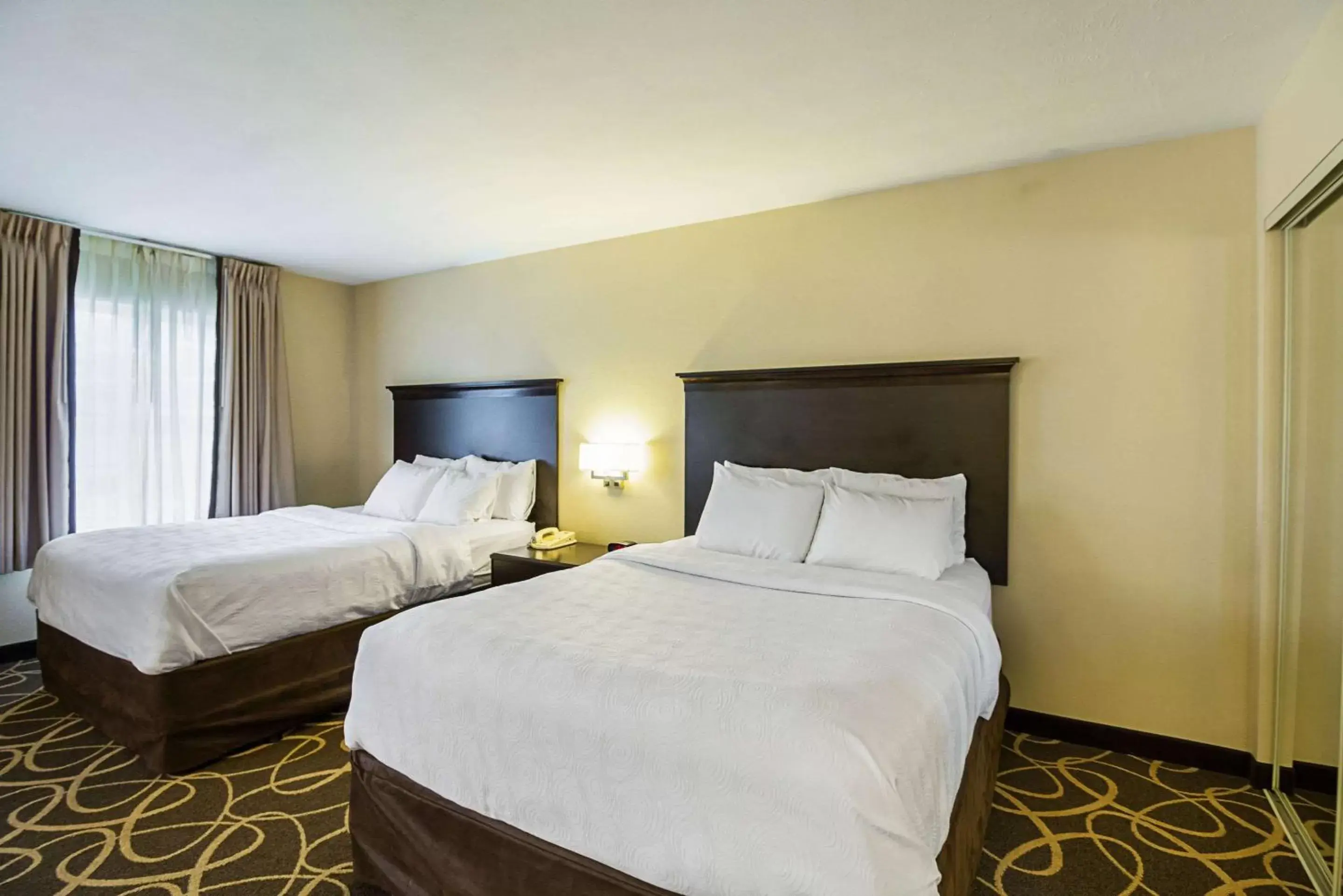 Bedroom, Bed in MainStay Suites Fargo - I-94 Medical Center