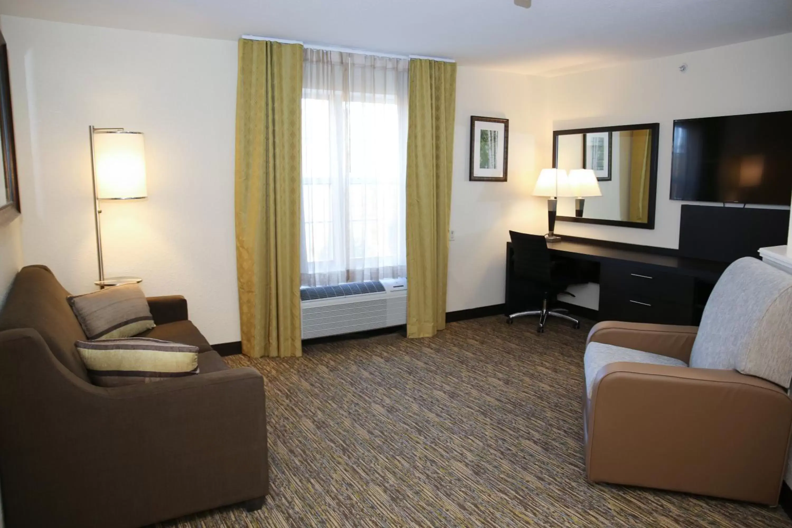 Bedroom, Seating Area in Candlewood Suites - Portland - Scarborough, an IHG Hotel