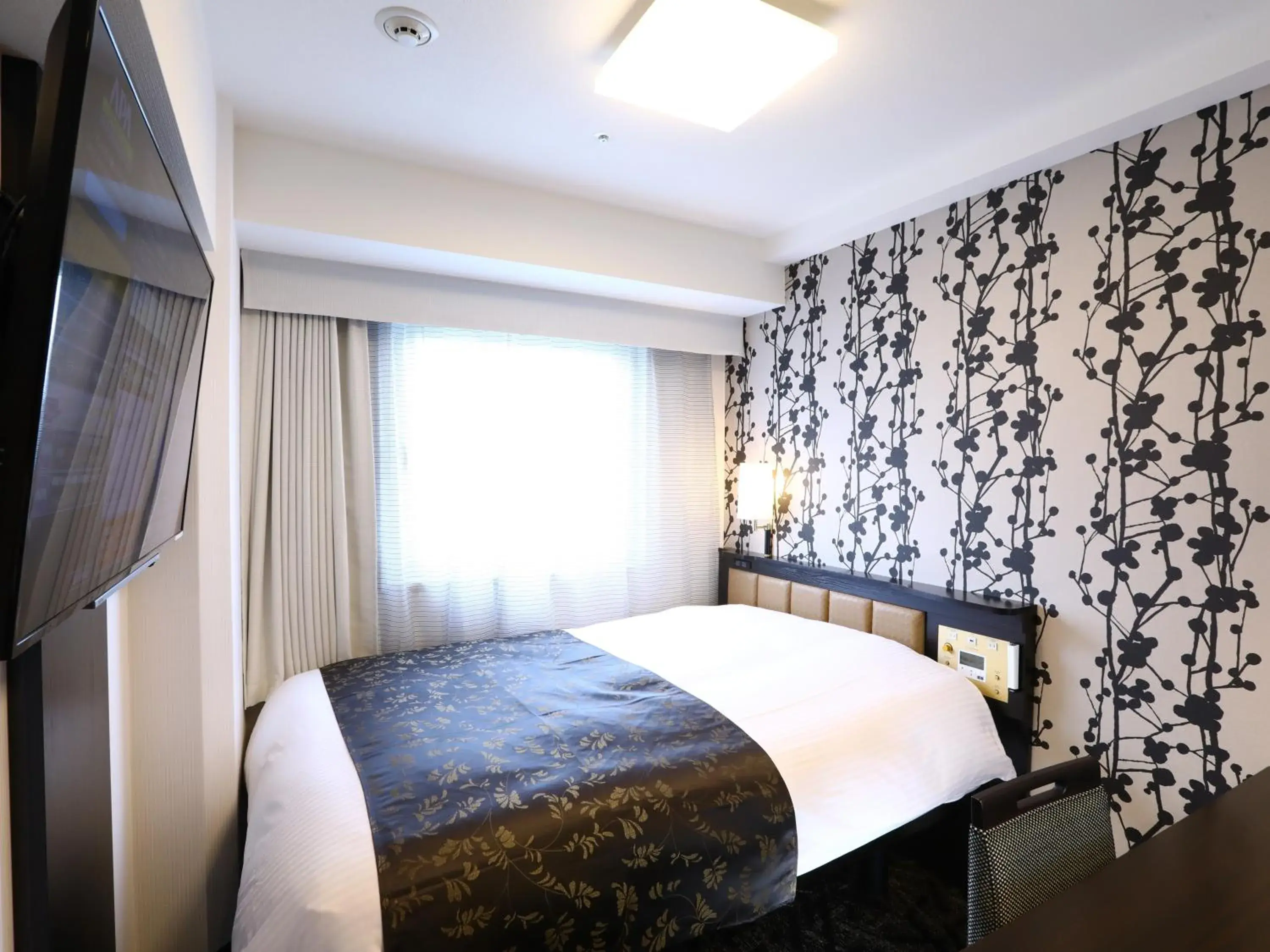 Photo of the whole room, Bed in APA Hotel Ayase Ekimae