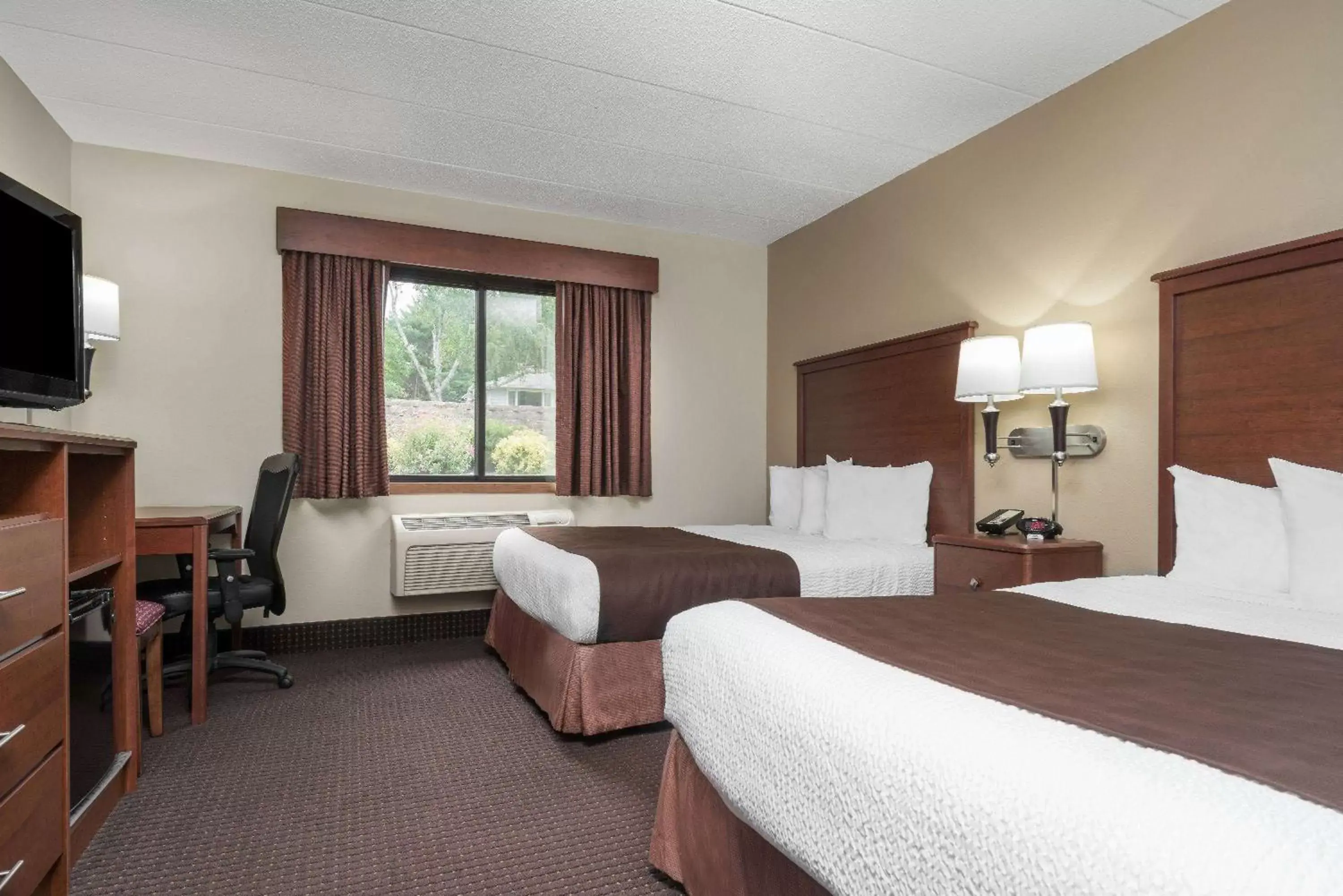 Photo of the whole room, Bed in AmericInn by Wyndham Lake City