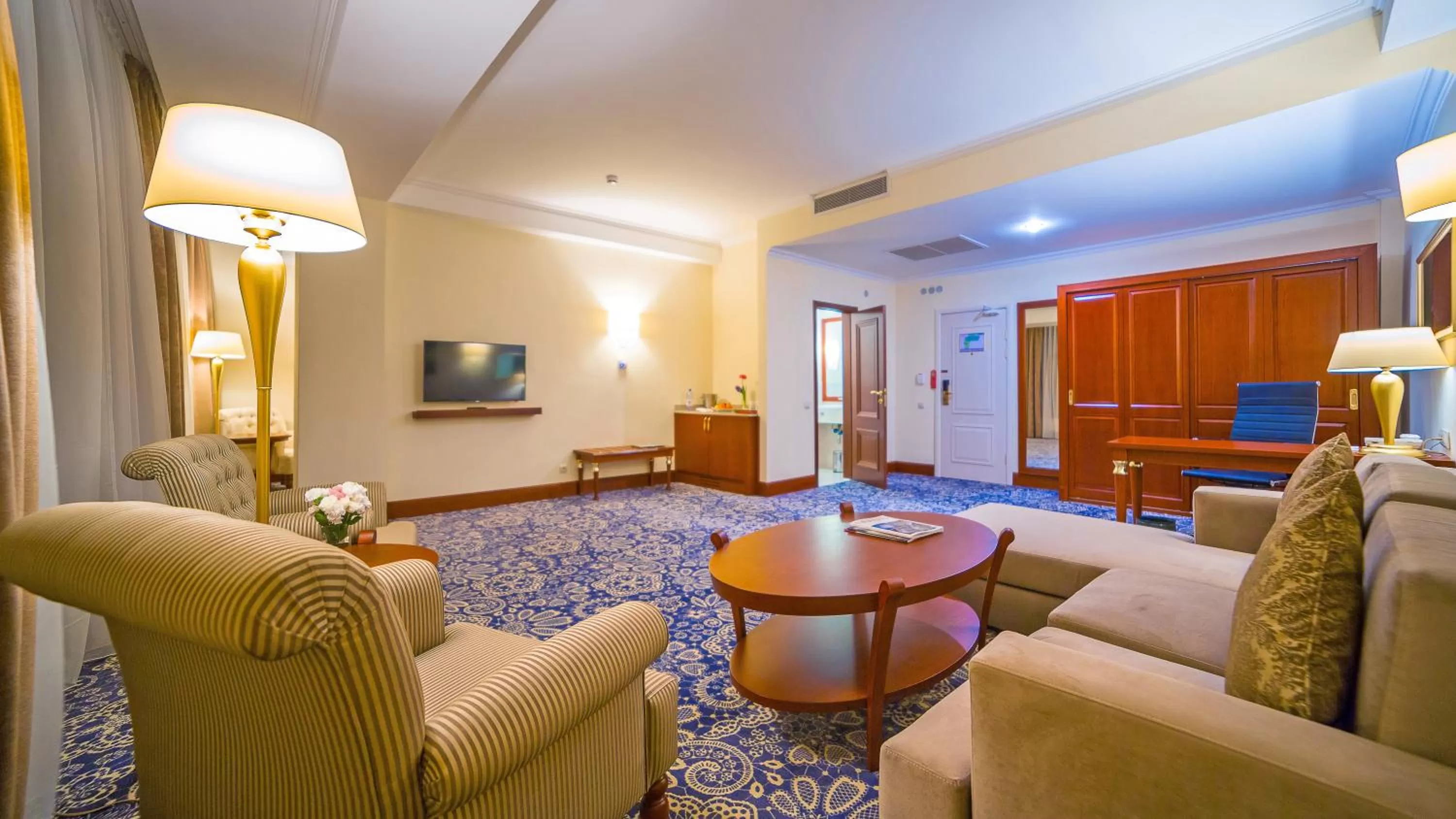 Seating area in Ramada by Wyndham Almaty