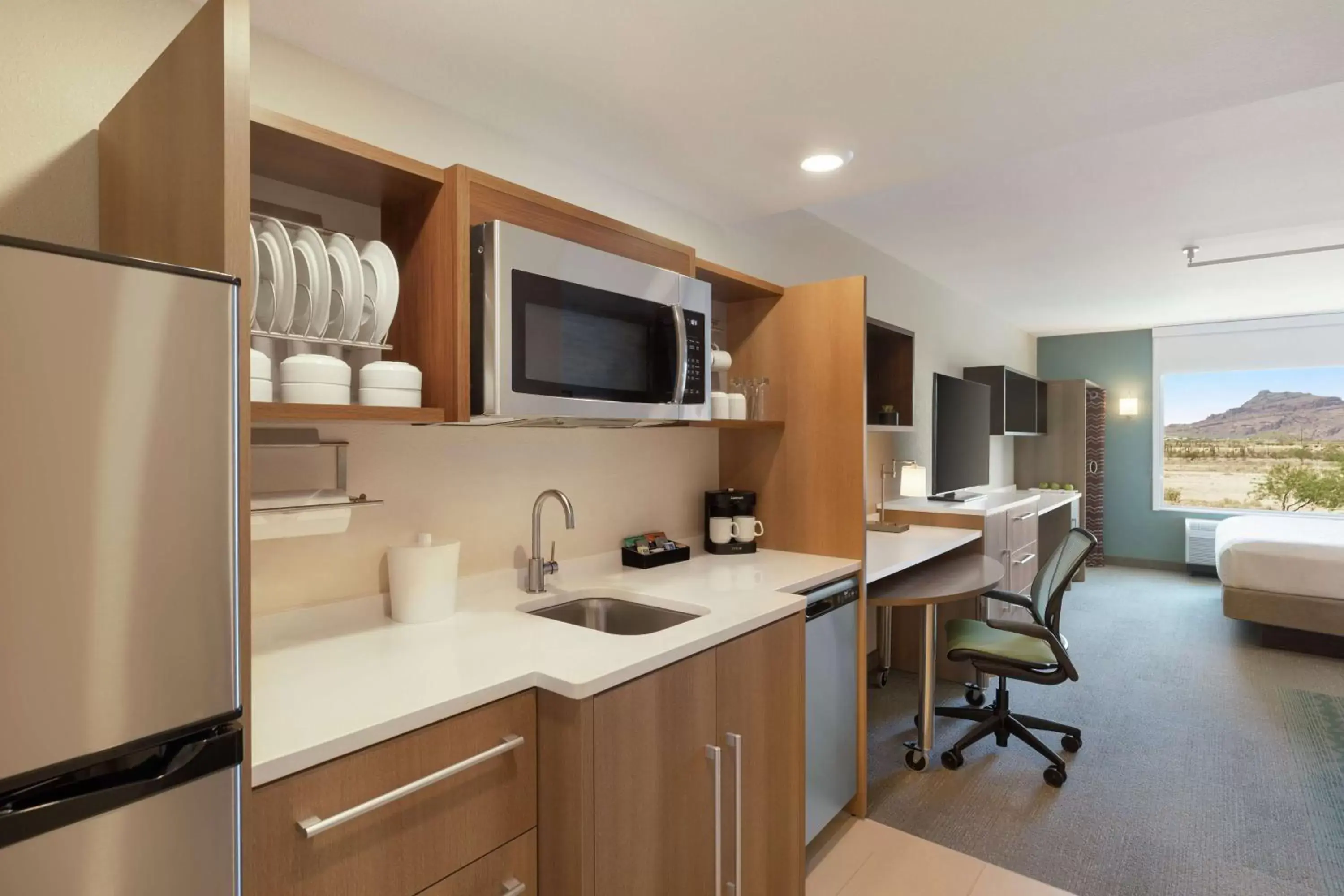 Bedroom, Kitchen/Kitchenette in Home2 Suites By Hilton Mesa Longbow, Az