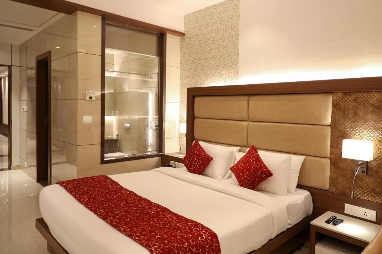 Bed in Hotel Gurudev Grand