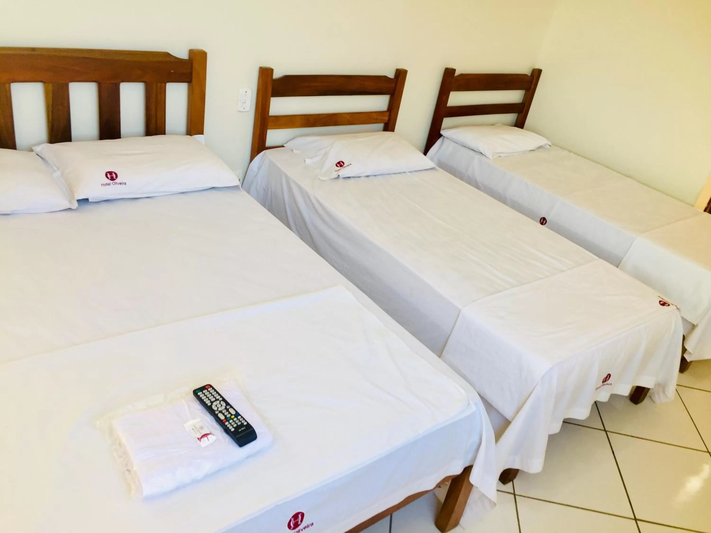 Bed in Hotel Oliveira