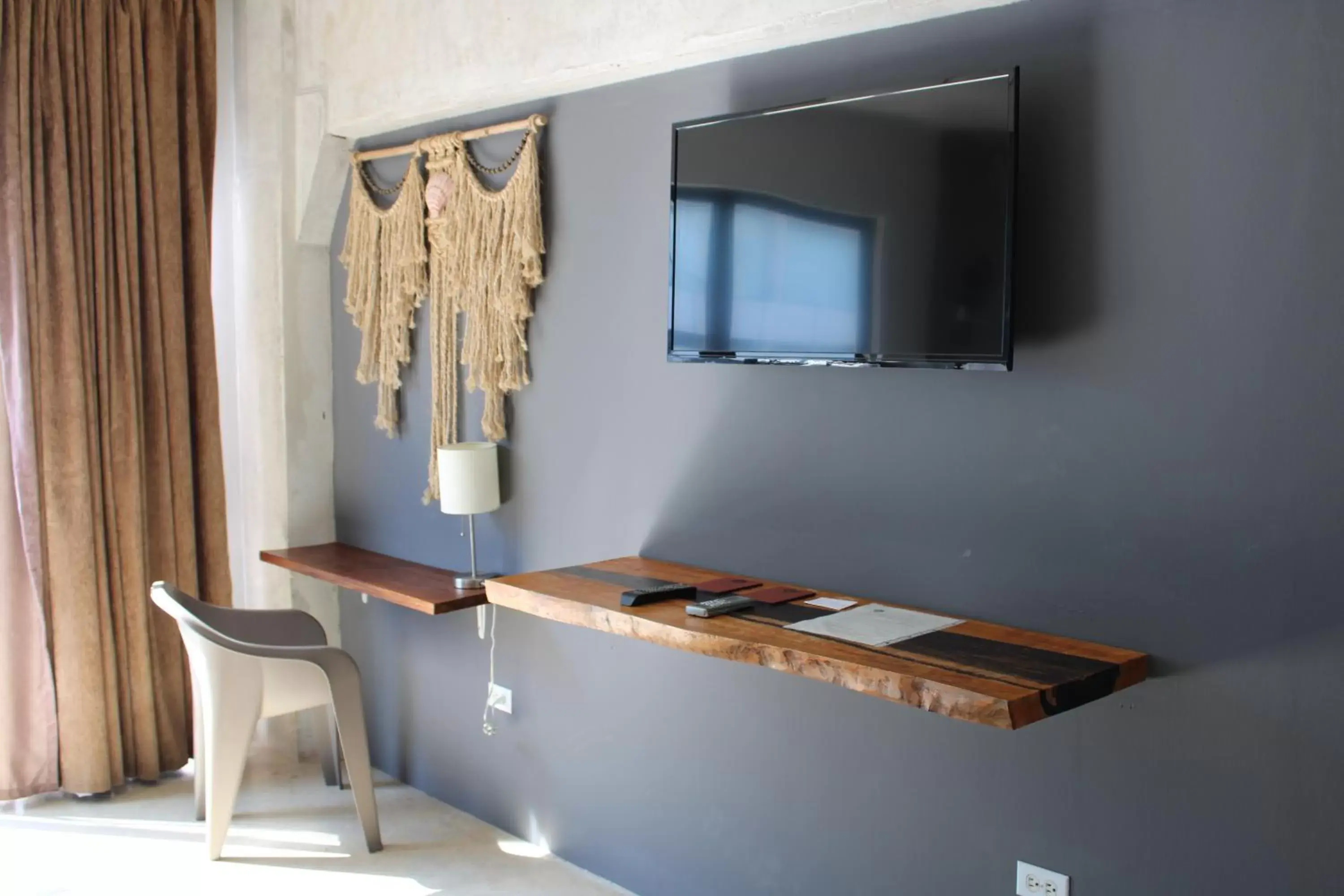 Photo of the whole room, TV/Entertainment Center in Hotel 52 Playa del Carmen