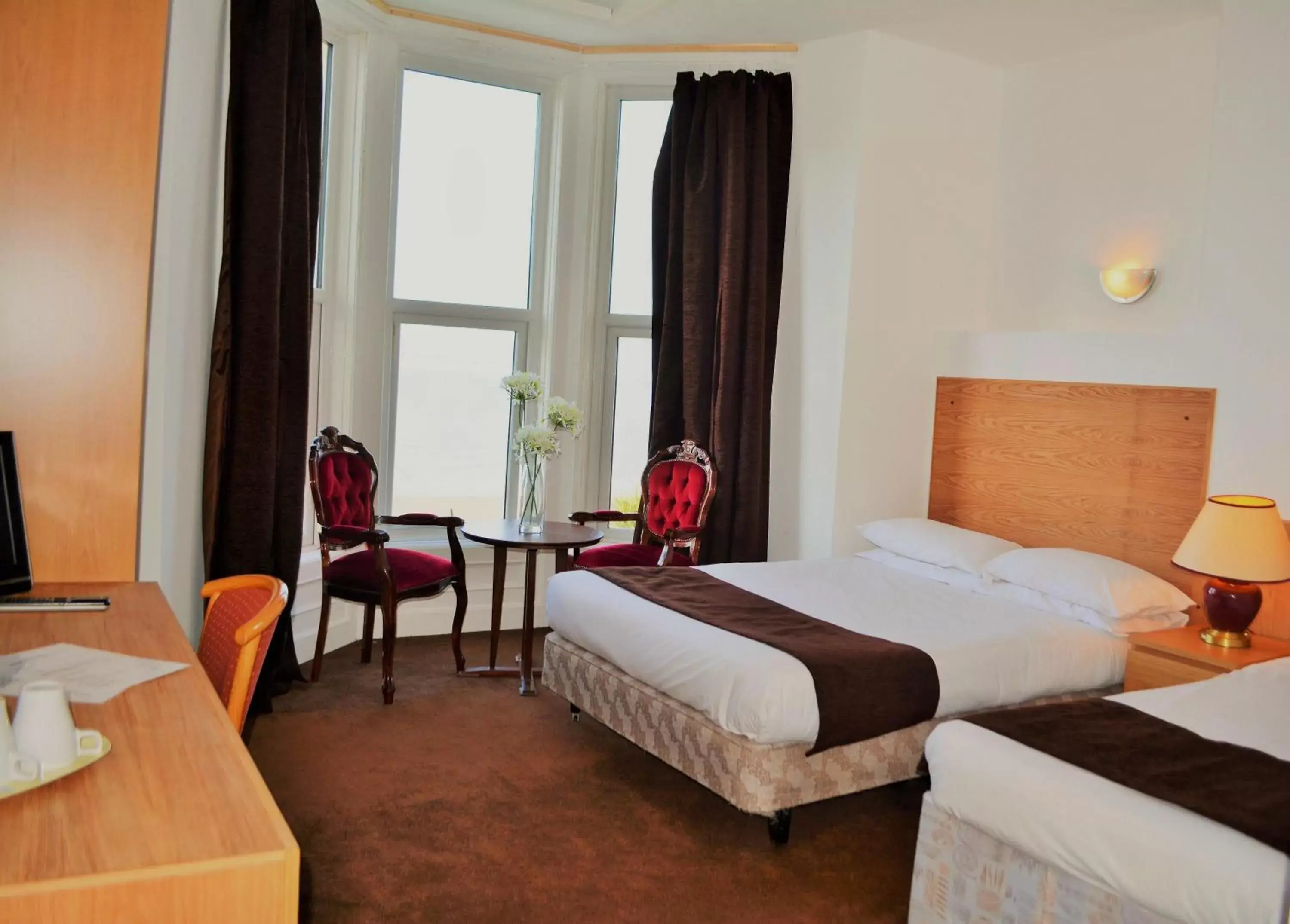 Seating area, Bed in Four Saints Brig Y Don Hotel Seating area, Bed in Four Saints Brig Y Don Hotel