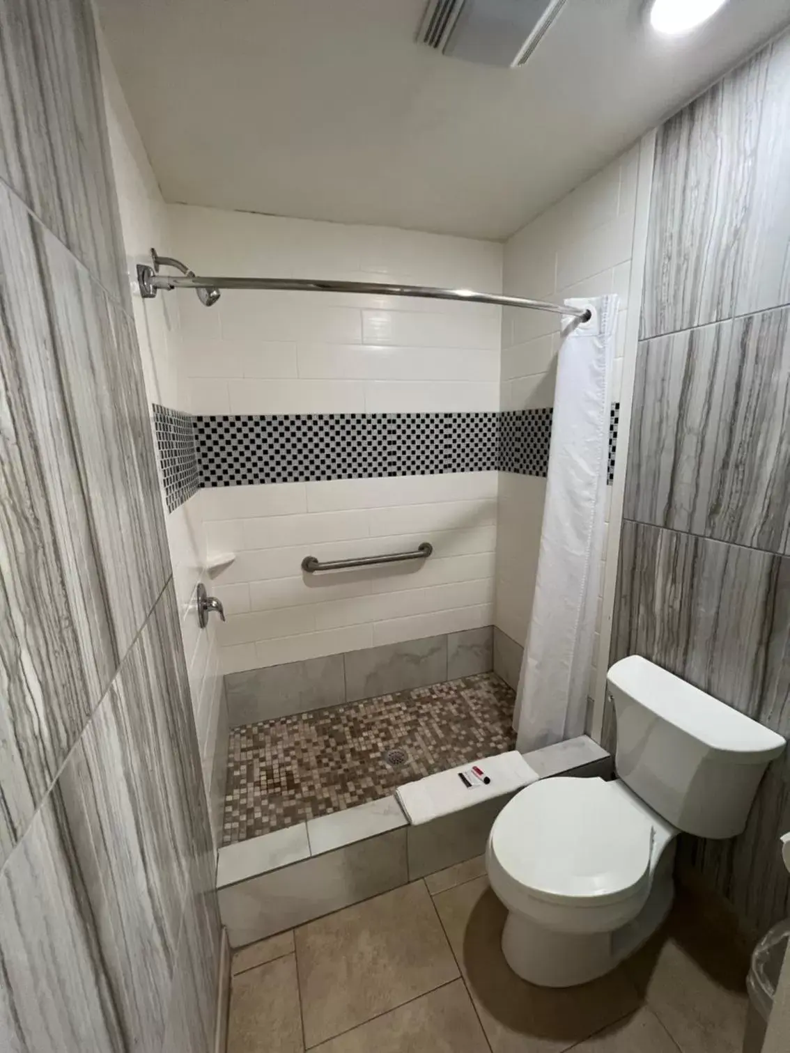 Bathroom in Super 8 by Wyndham McAllen-Downtown-Airport-LA Plaza Mall