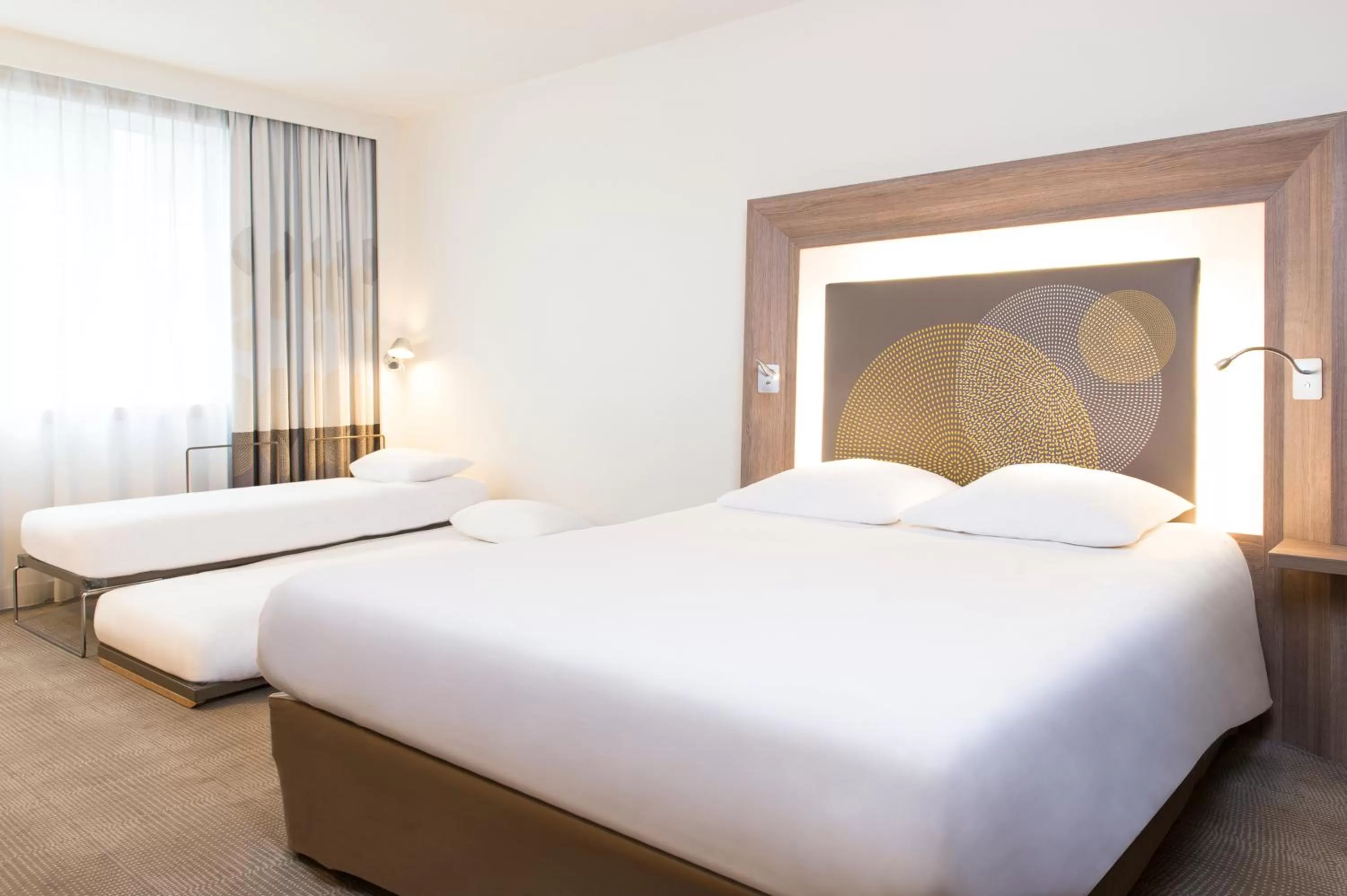 Bed in Novotel Brussels Airport