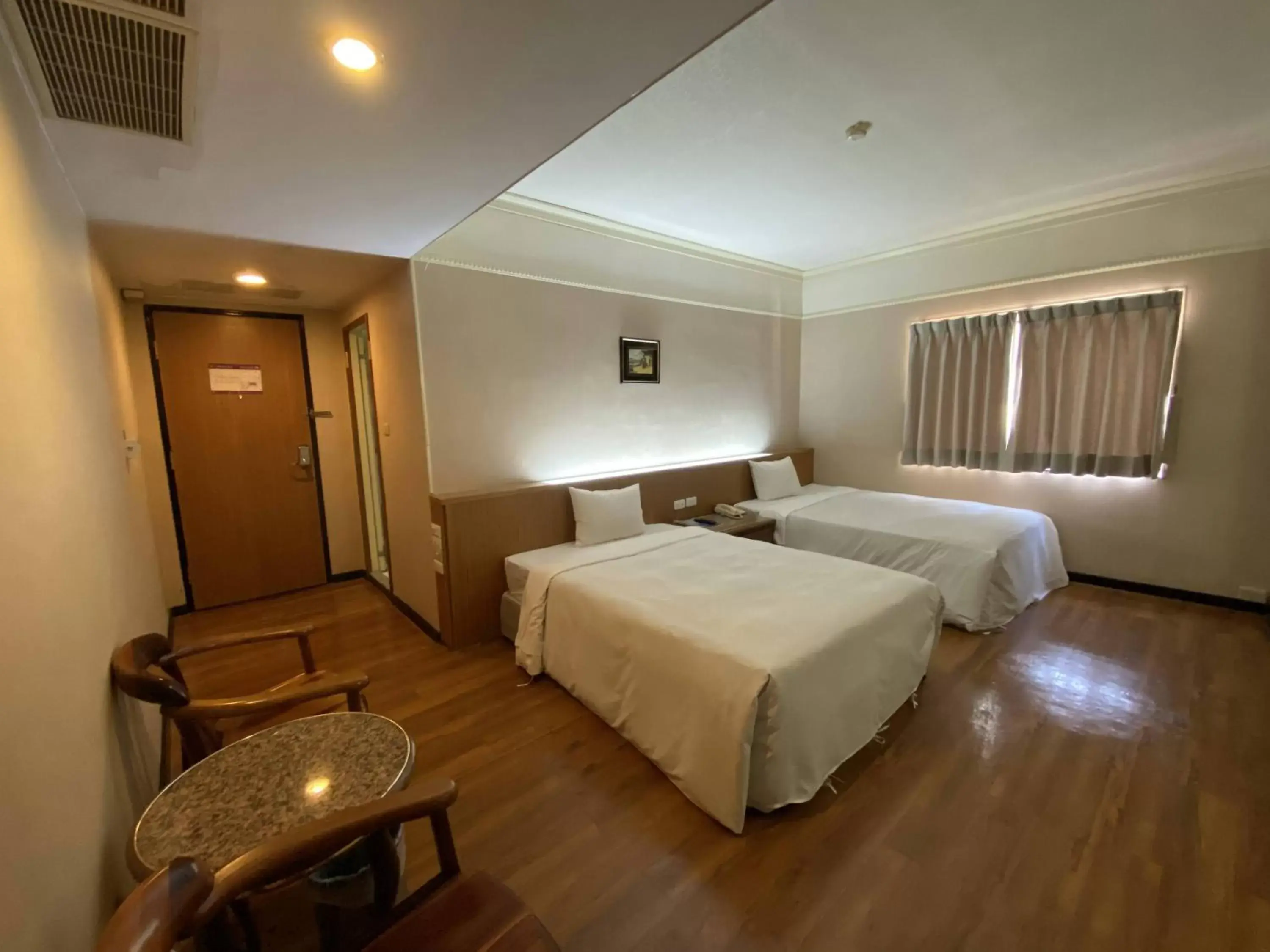 Bed in Tapeng Bay Holiday Hotel