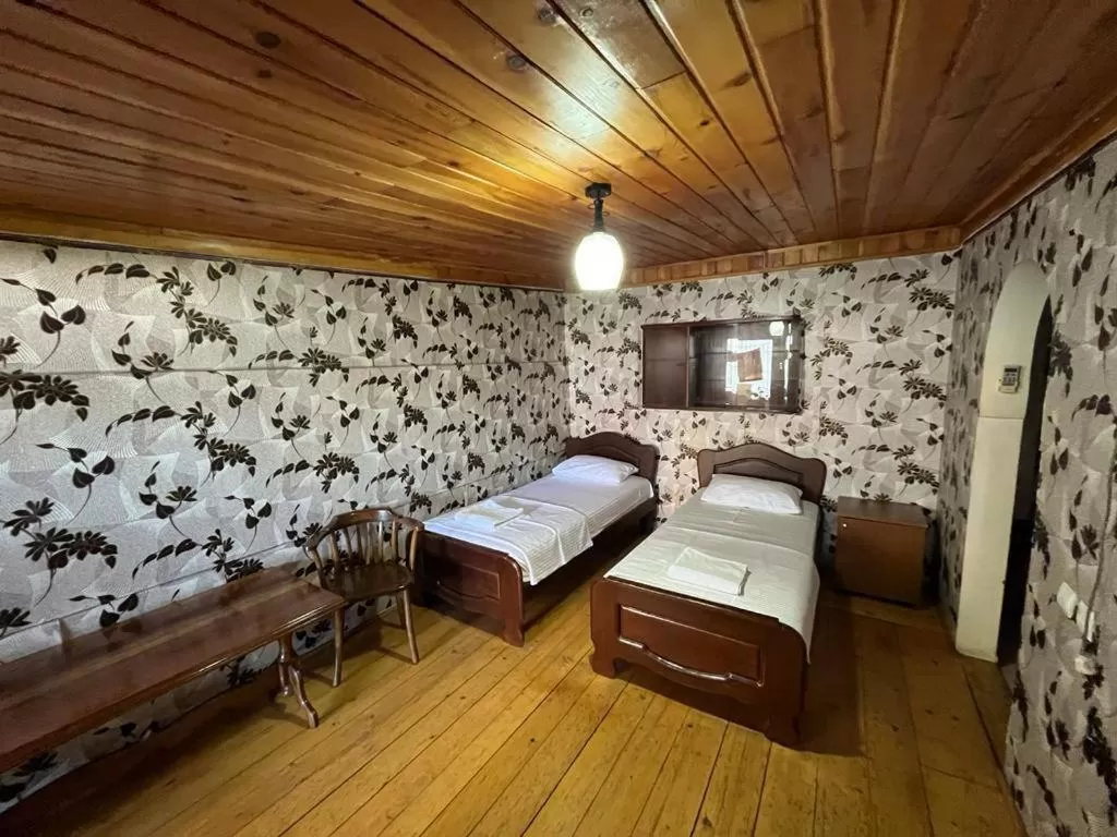 Photo of the whole room, Bed in OLD ClTY HOTEL BATUMI