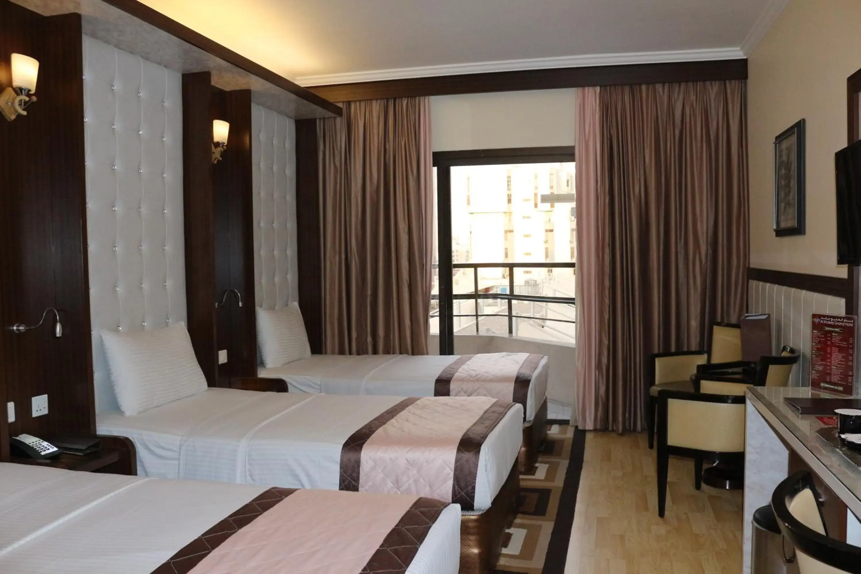 Bed in Al Khaleej Grand Hotel