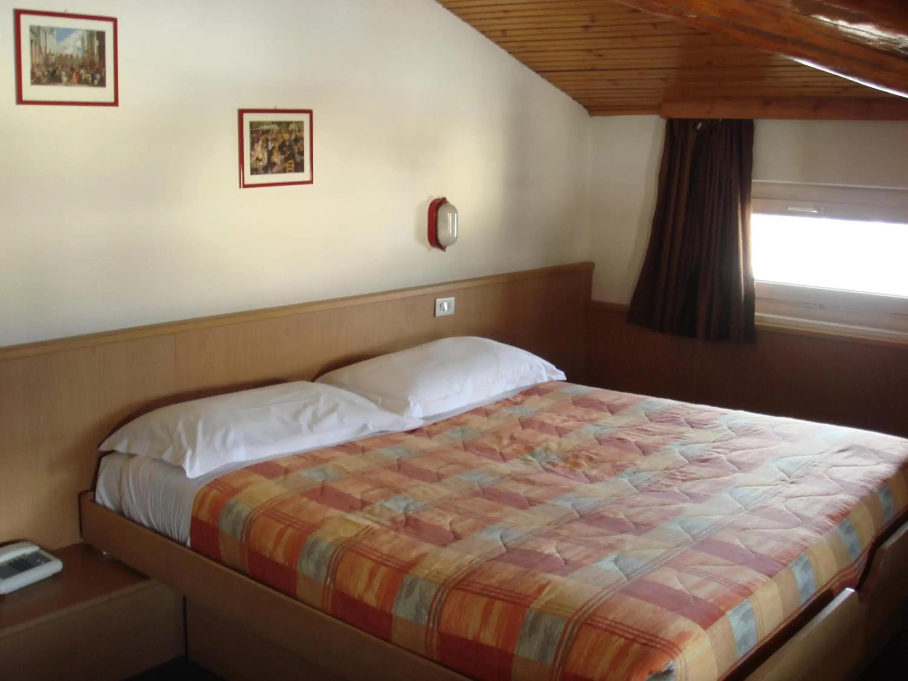 Bed in Hotel Capitani