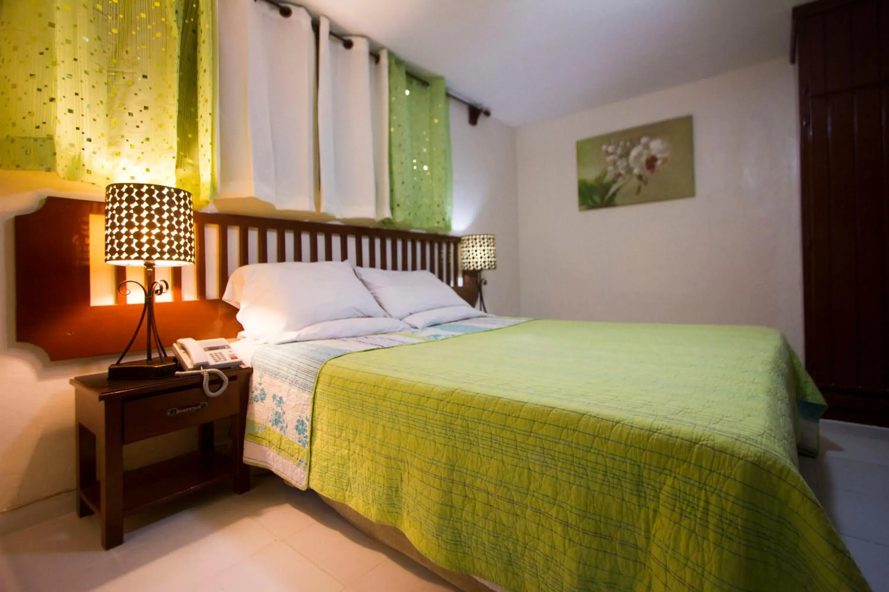 Bed in Ideal Villa Hotel