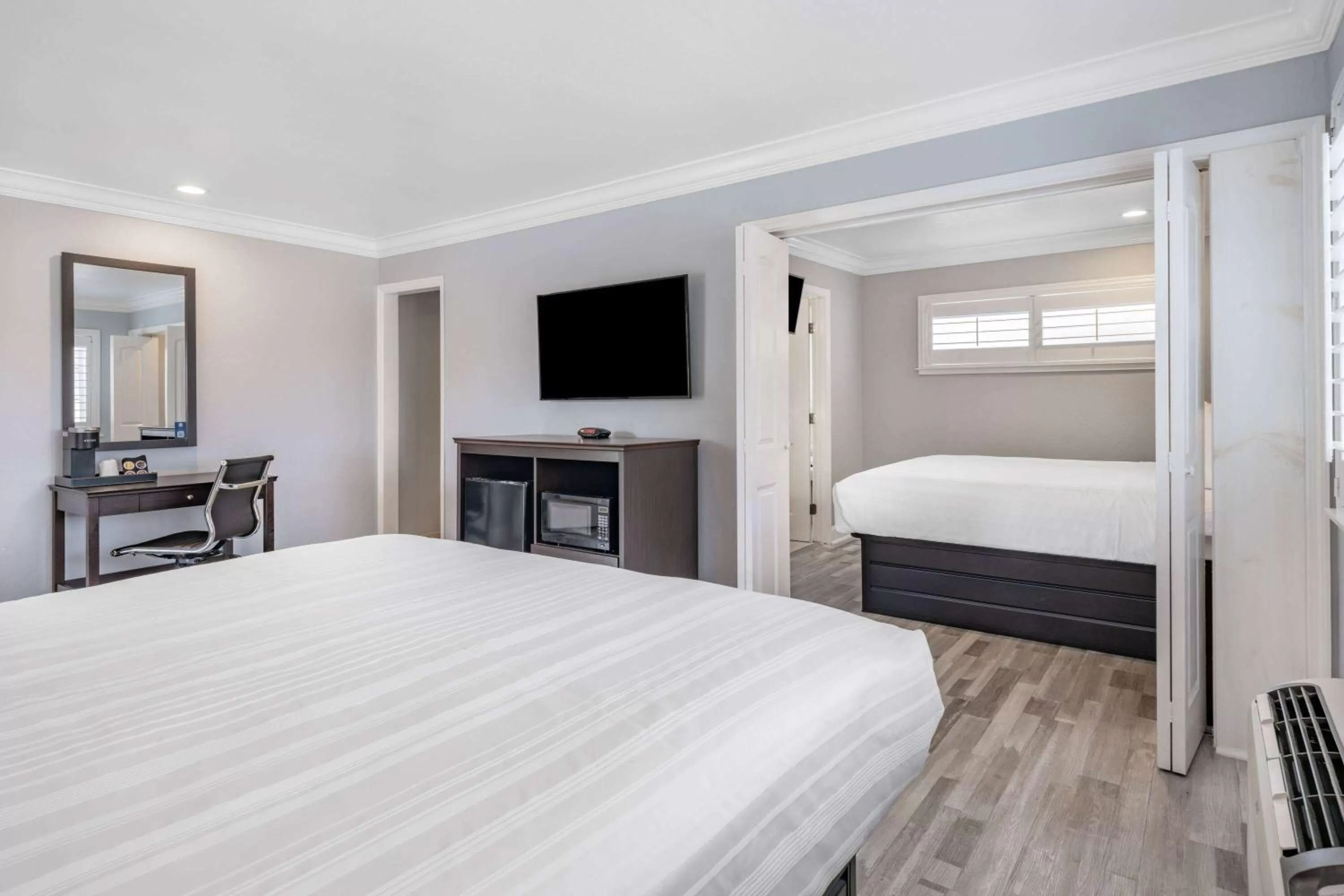 Bed in Aura Inn Monterey