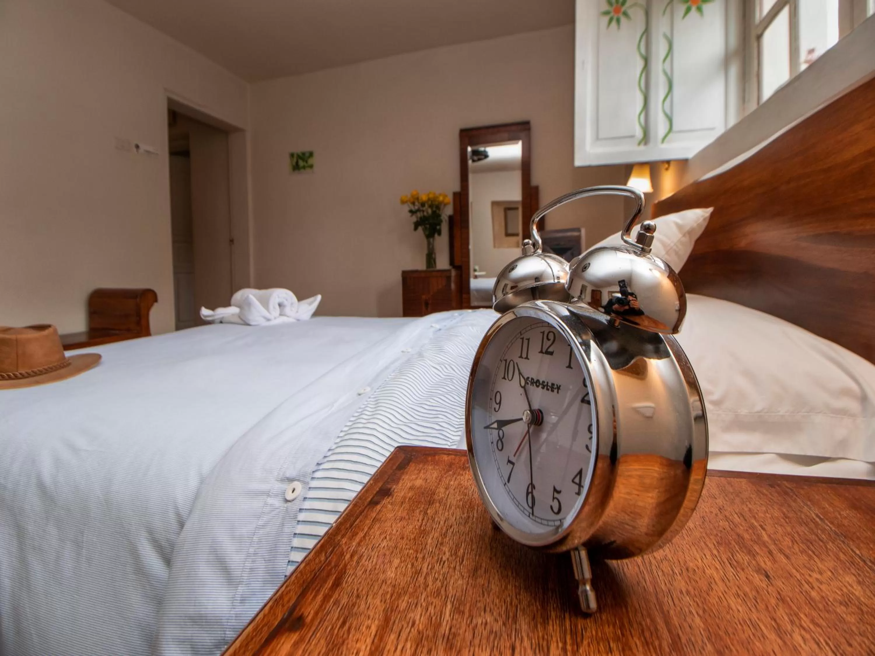 Bed in Hosteria Papagayo Cotopaxi