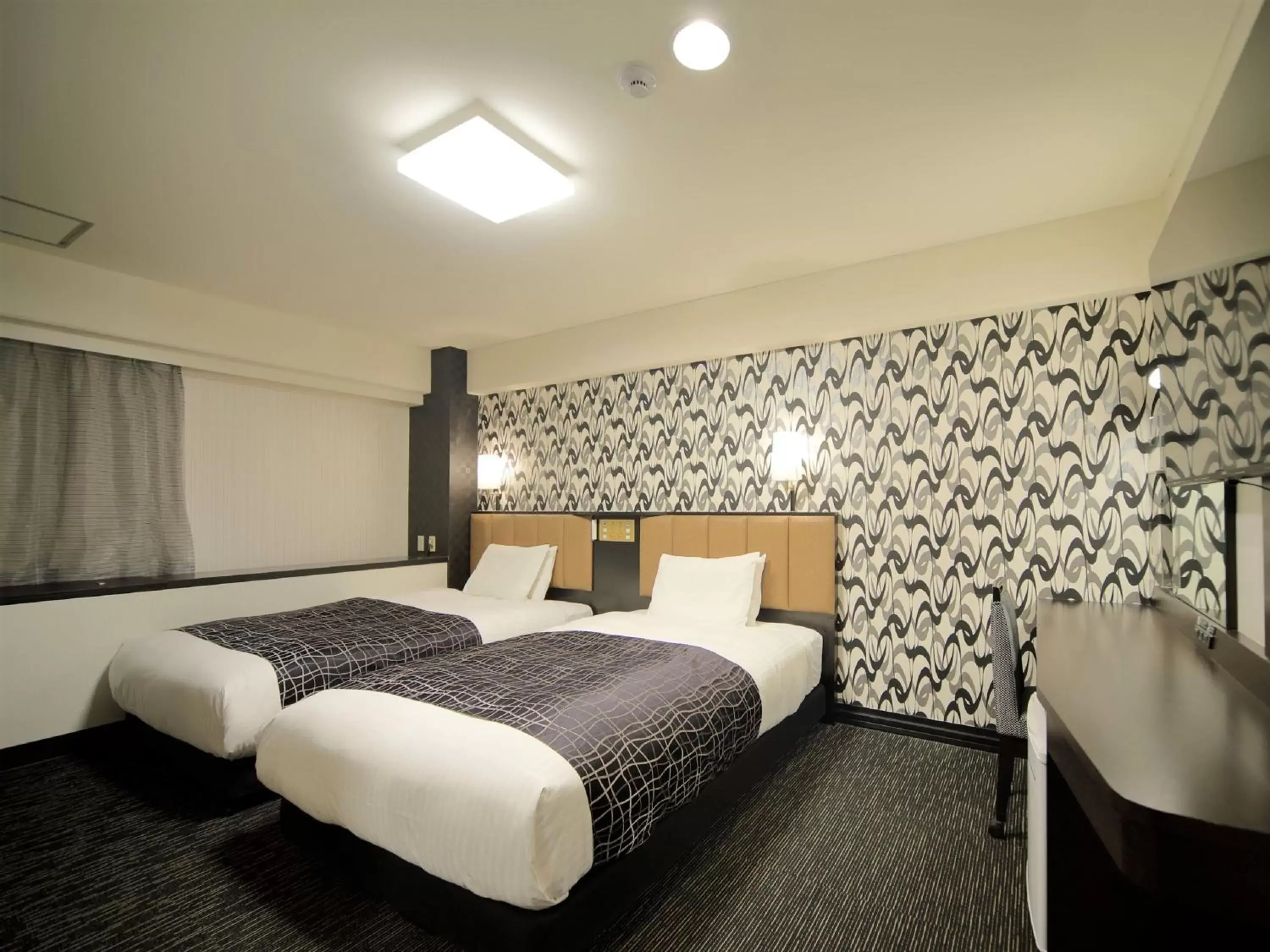 Photo of the whole room, Bed in APA Hotel Kumamoto Sakuramachi Bus Terminal Minami Photo of the whole room, Bed in APA Hotel Kumamoto Sakuramachi Bus Terminal Minami