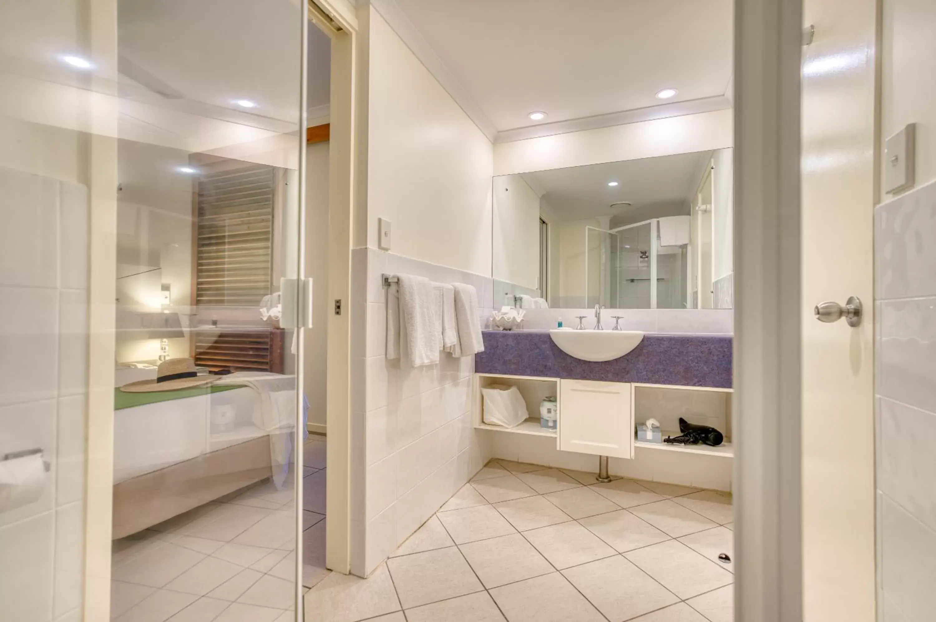 Shower, Bed in Freestyle Resort Port Douglas Shower, Bed in Freestyle Resort Port Douglas
