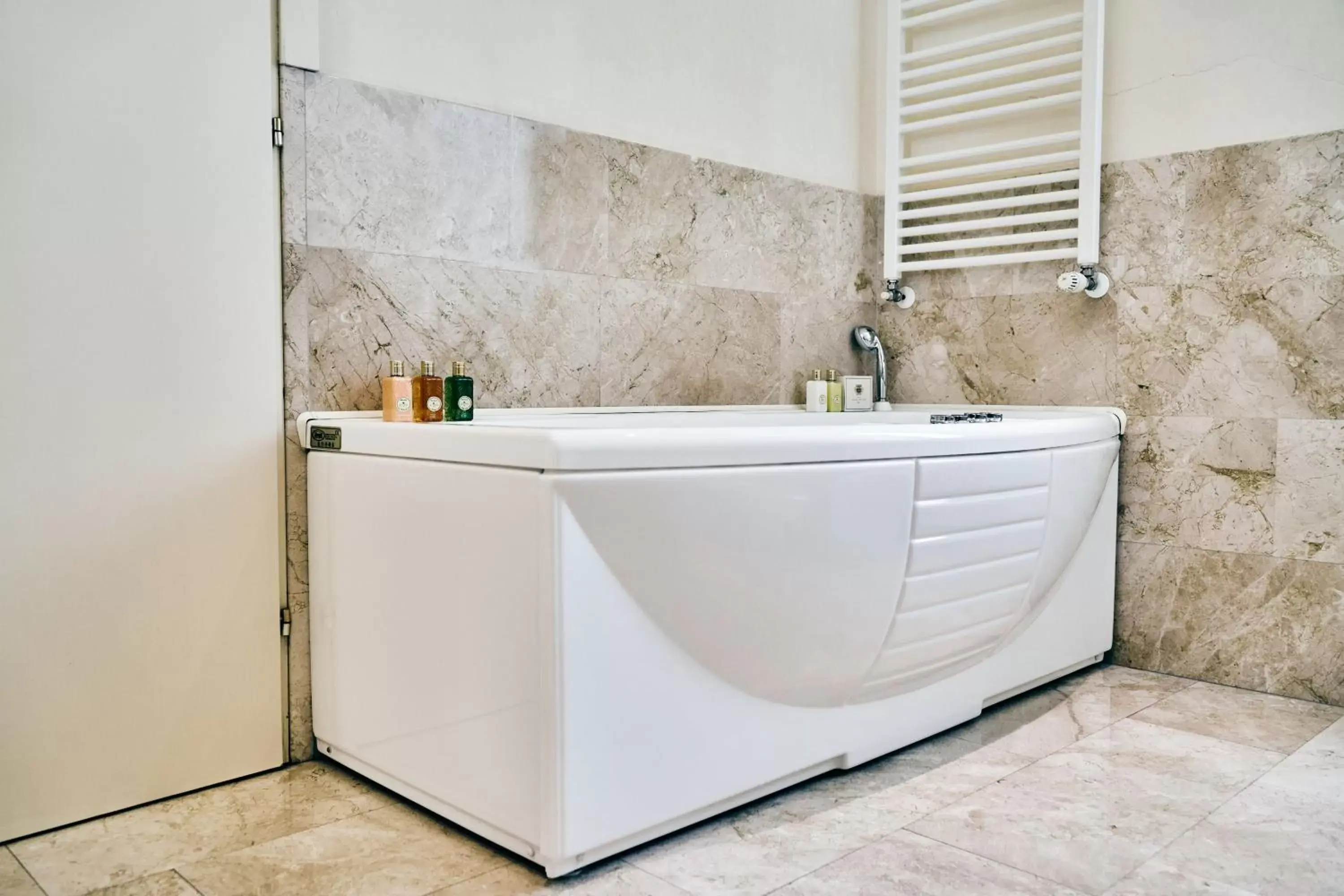 Bath, Bathroom in Ambassador Palace Hotel