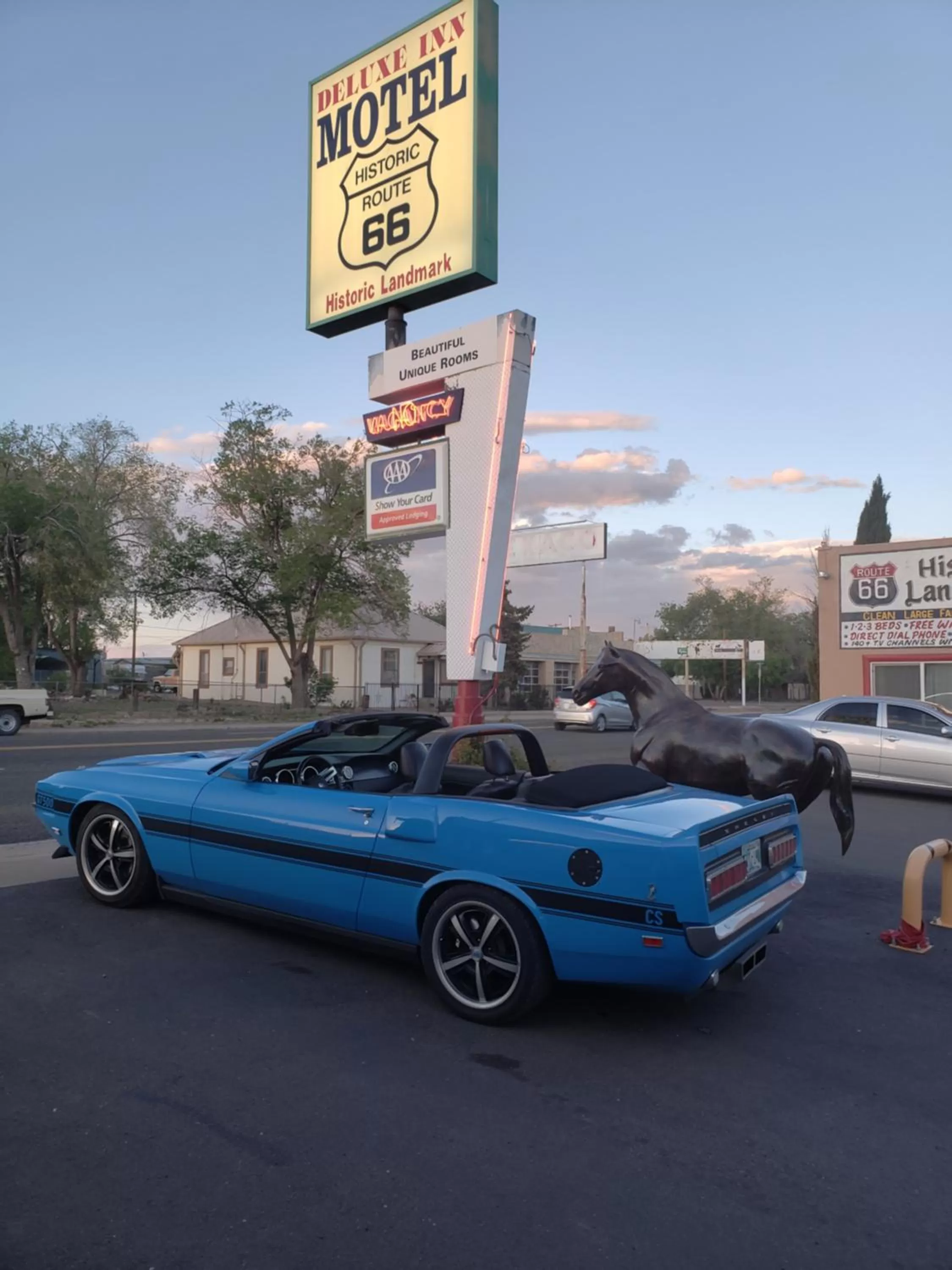 Property logo or sign in Deluxe Inn