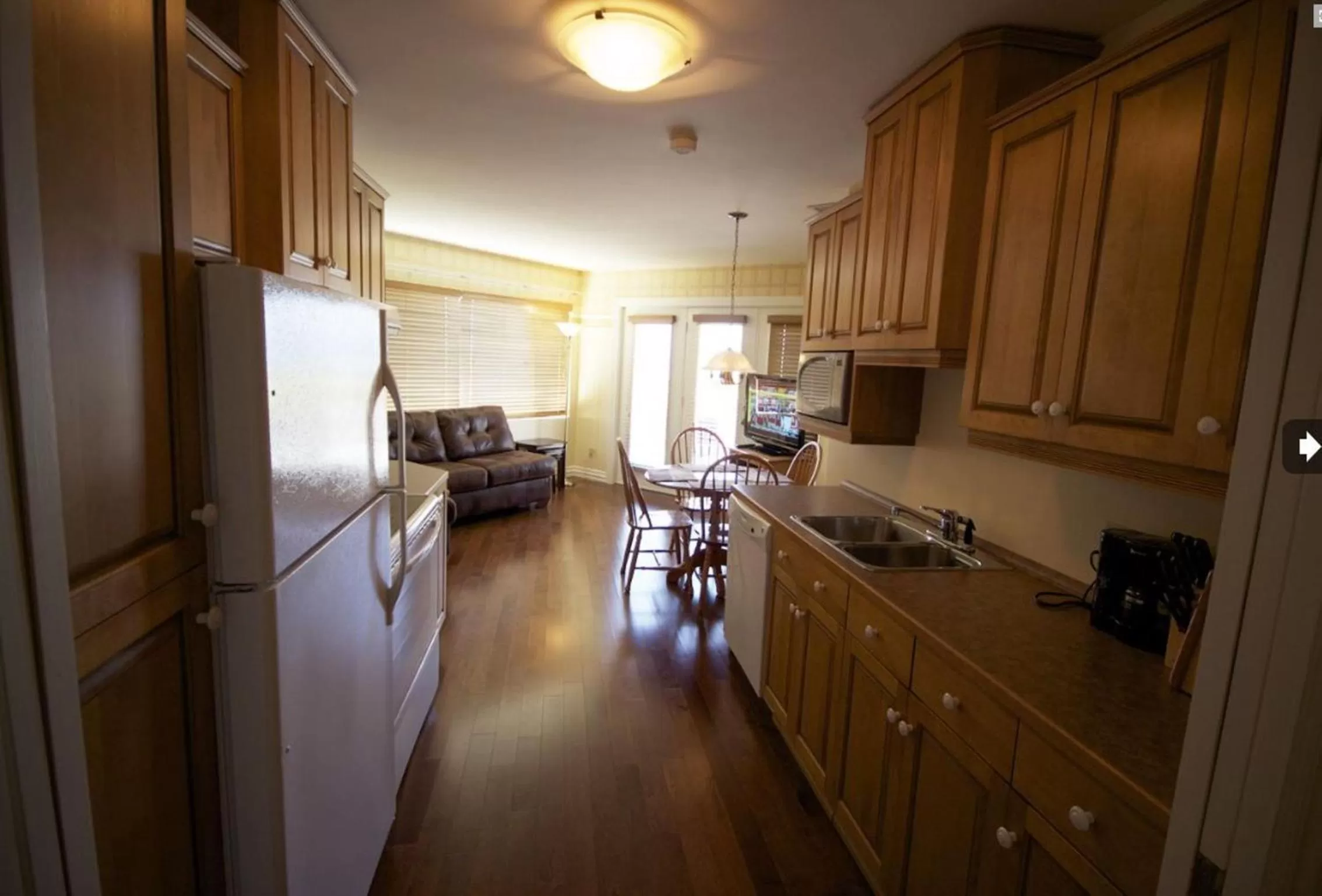 Kitchen or kitchenette in Hôtel Le Voyageur