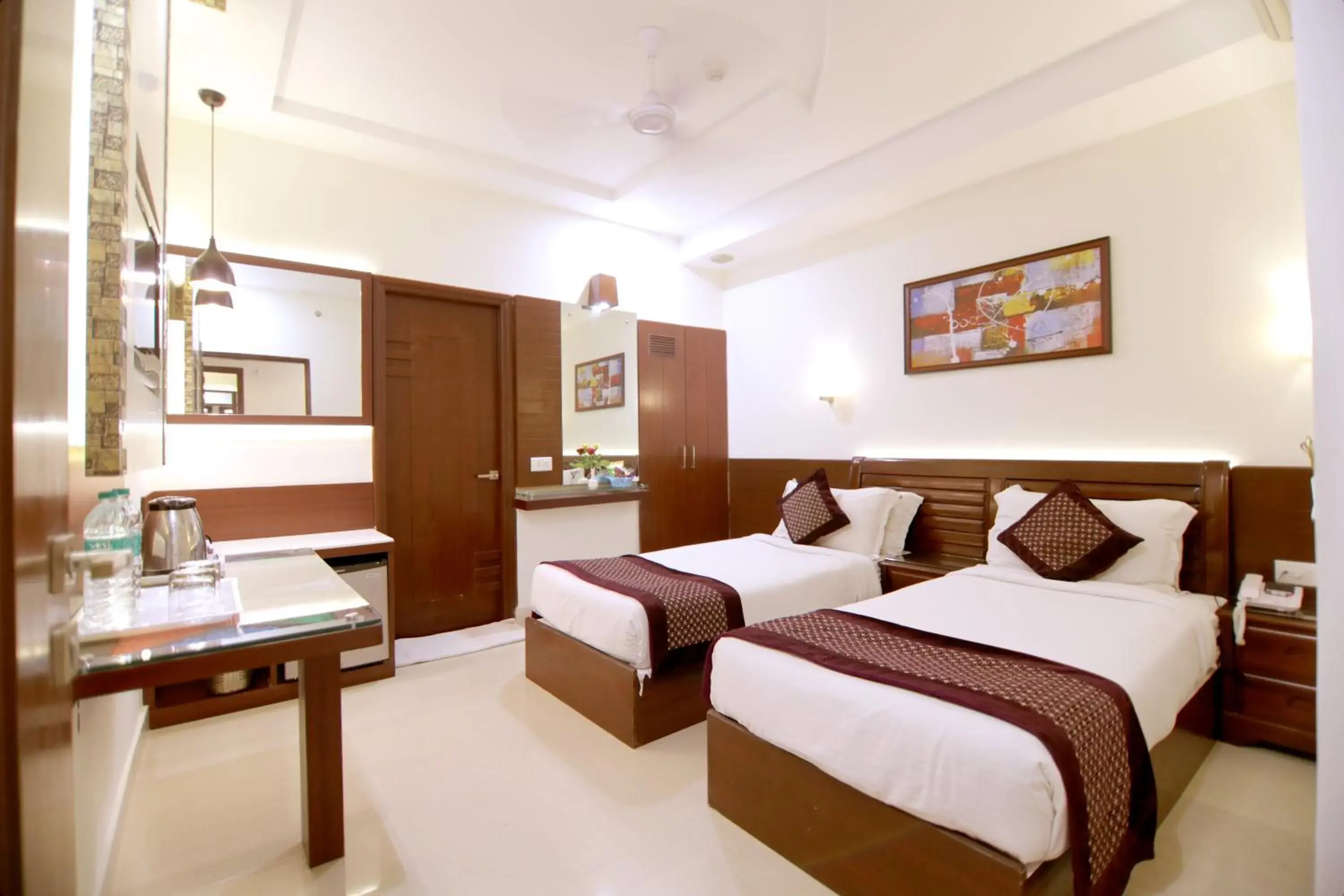 Bedroom in Taj Inn Hotel