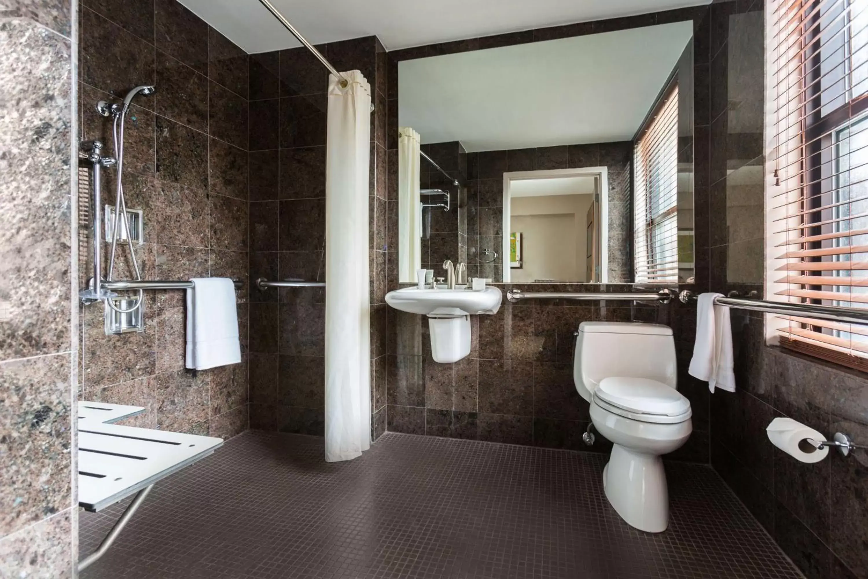 Bathroom in The Sam Houston Hotel, Curio Collection by Hilton