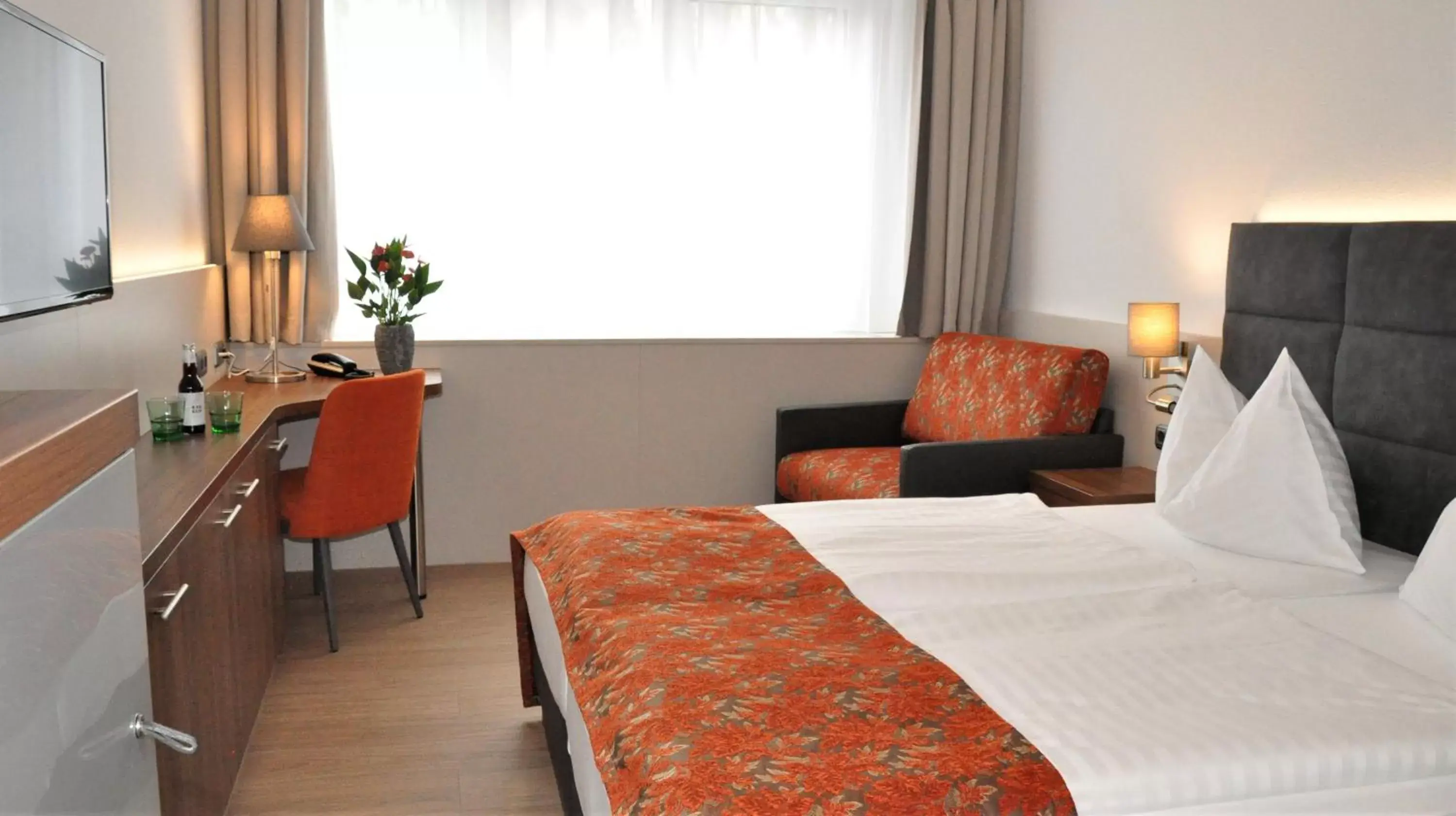 Photo of the whole room, Bed in Stadtoase Kolping Hotel