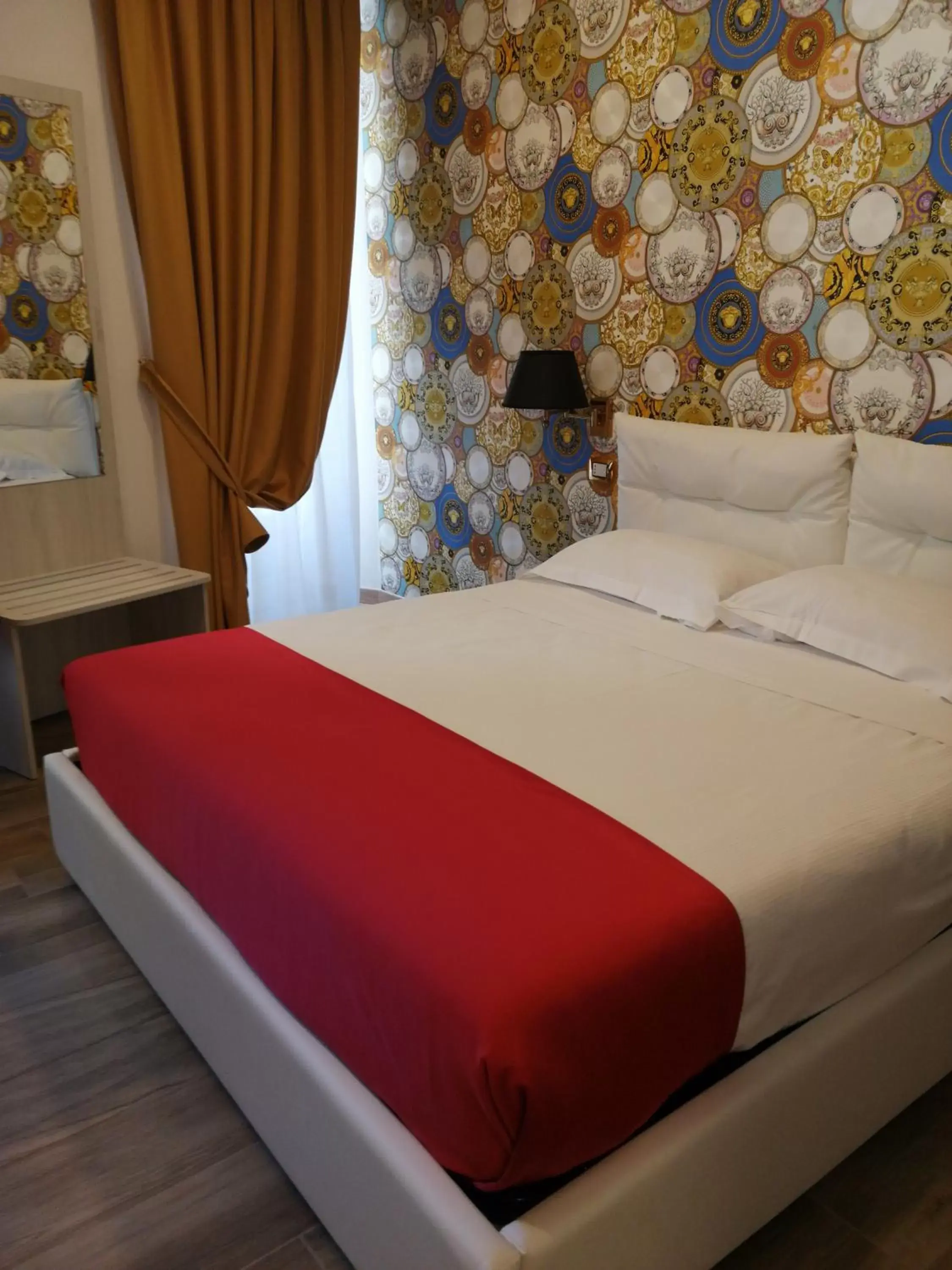 Bed in Hotel Cinquantatre