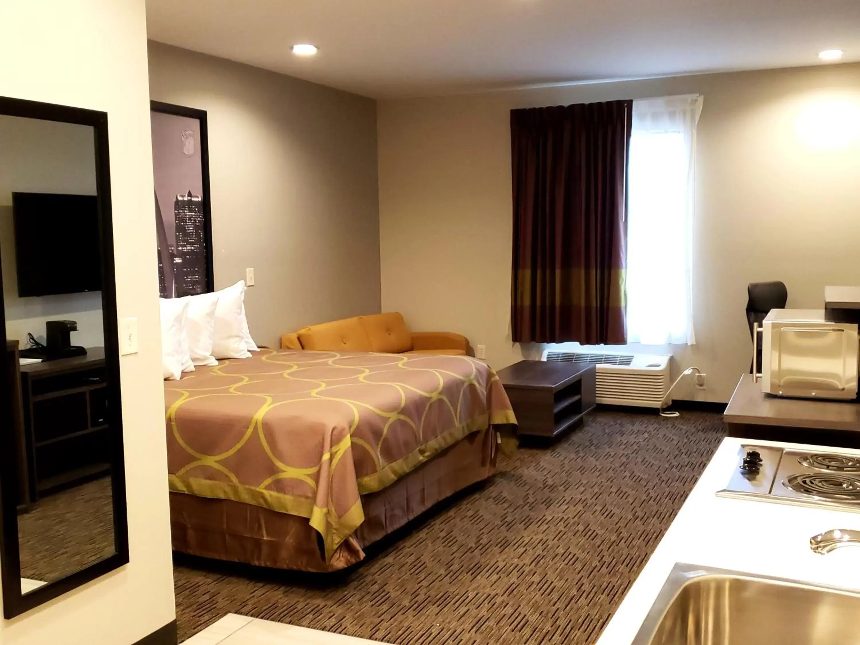 Bed in Super 8 by Wyndham St. Louis North