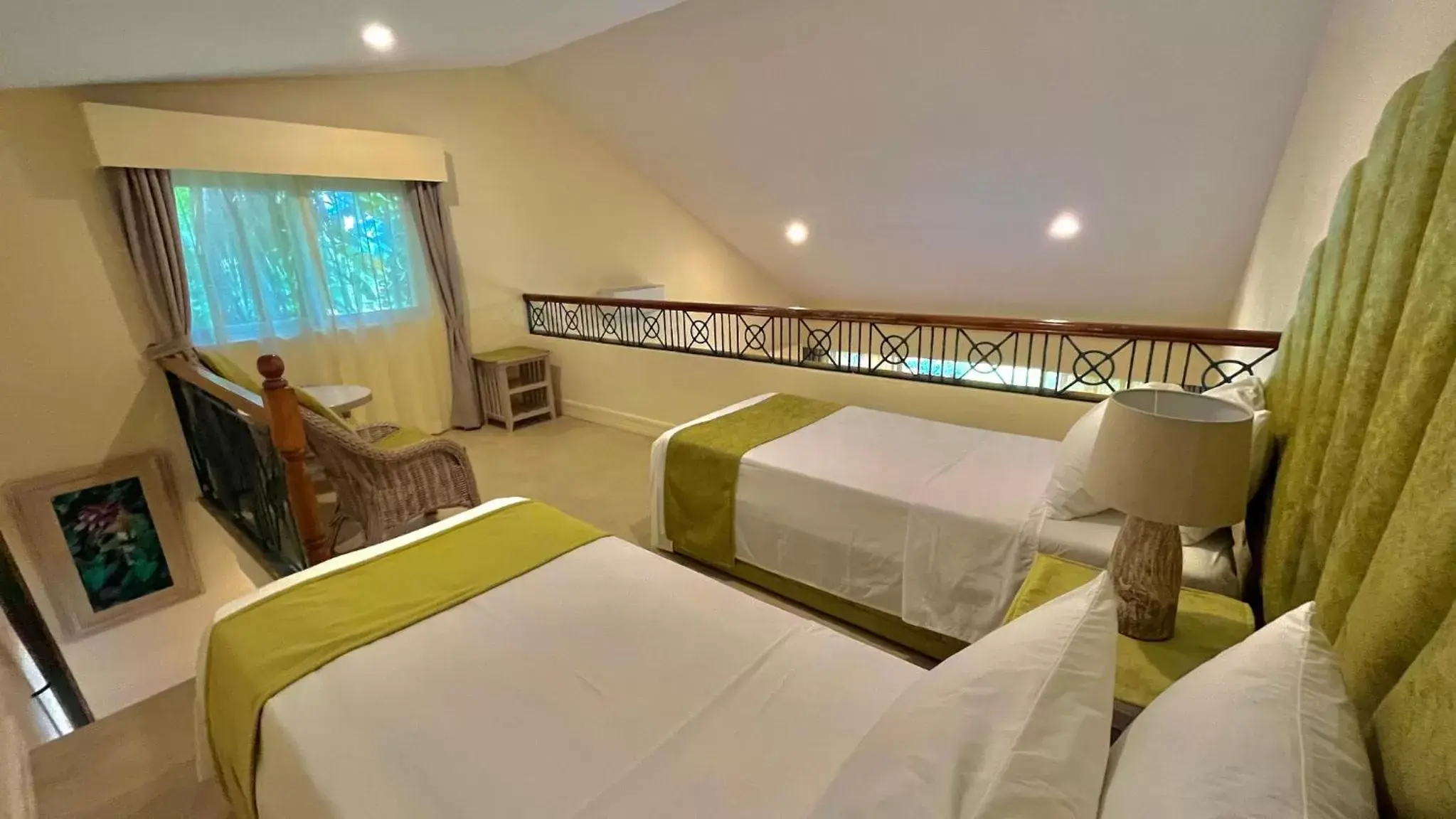 Bed in Coco Grove Beach Resort, Siquijor Island