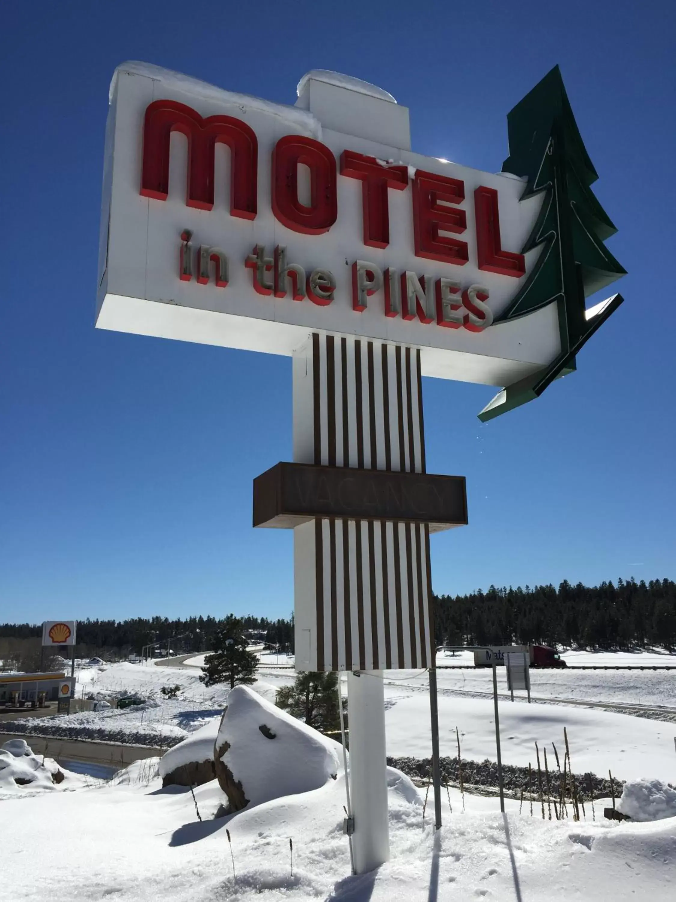 Property logo or sign, Winter in Motel In The Pines