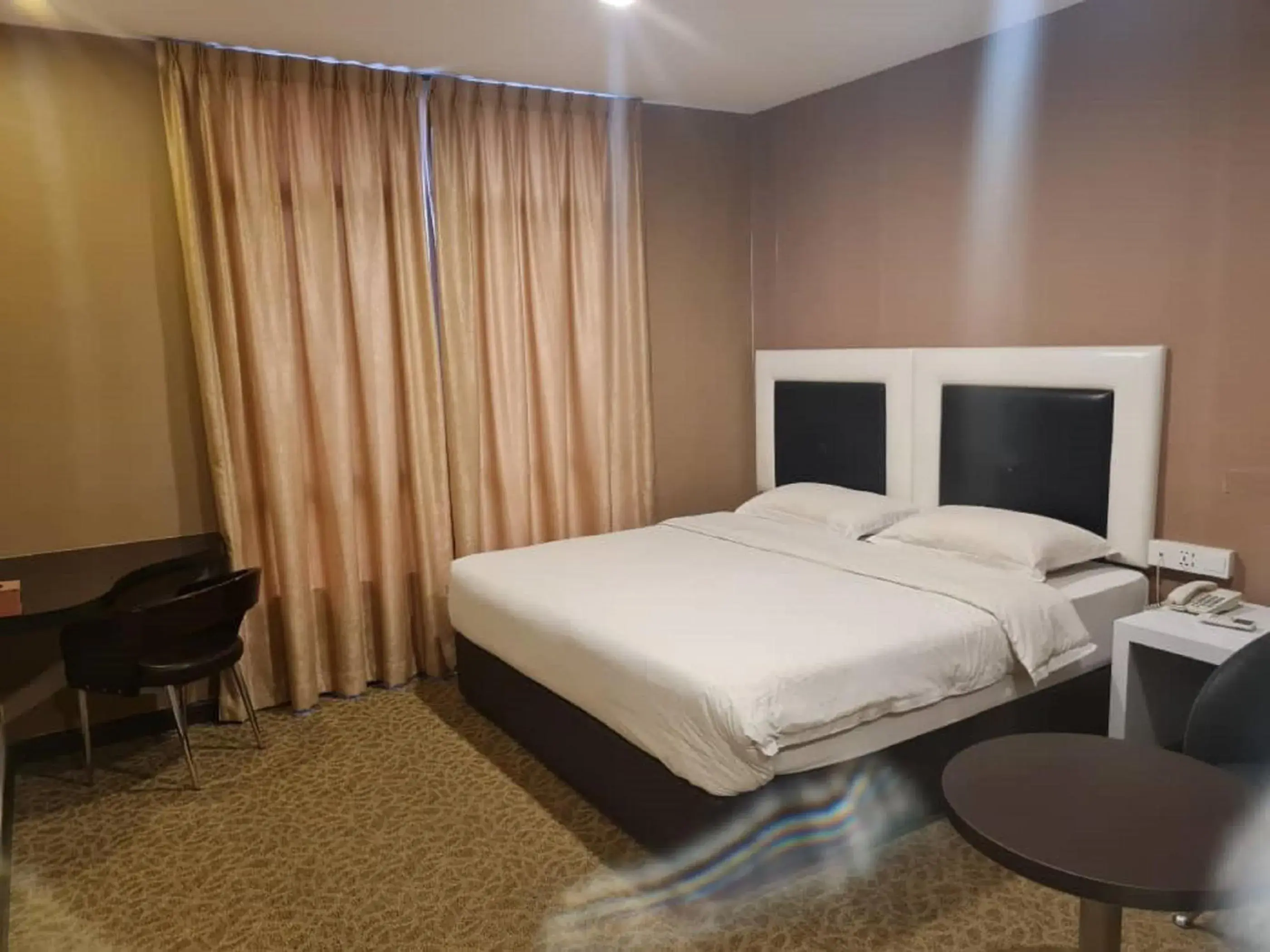 Bed in Hotel Nusa CT