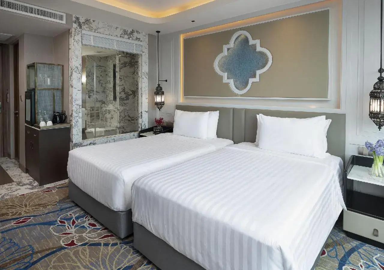 Bed in Valia Hotel Bangkok
