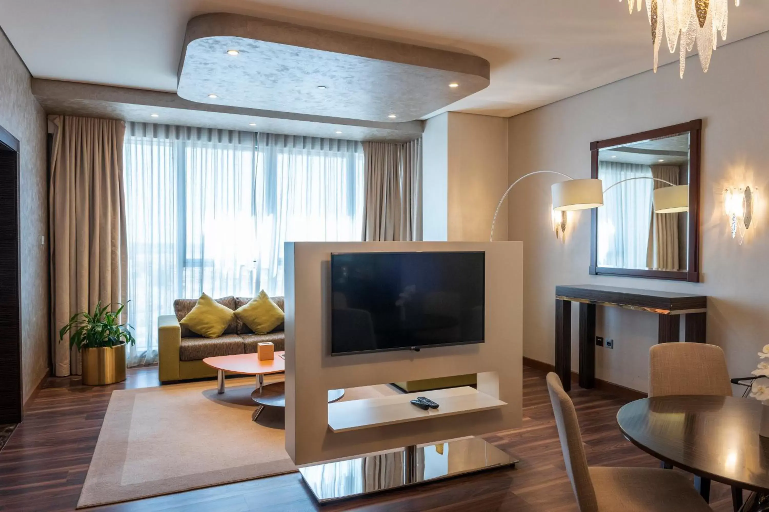 Seating area, TV/Entertainment Center in Remal Hotel