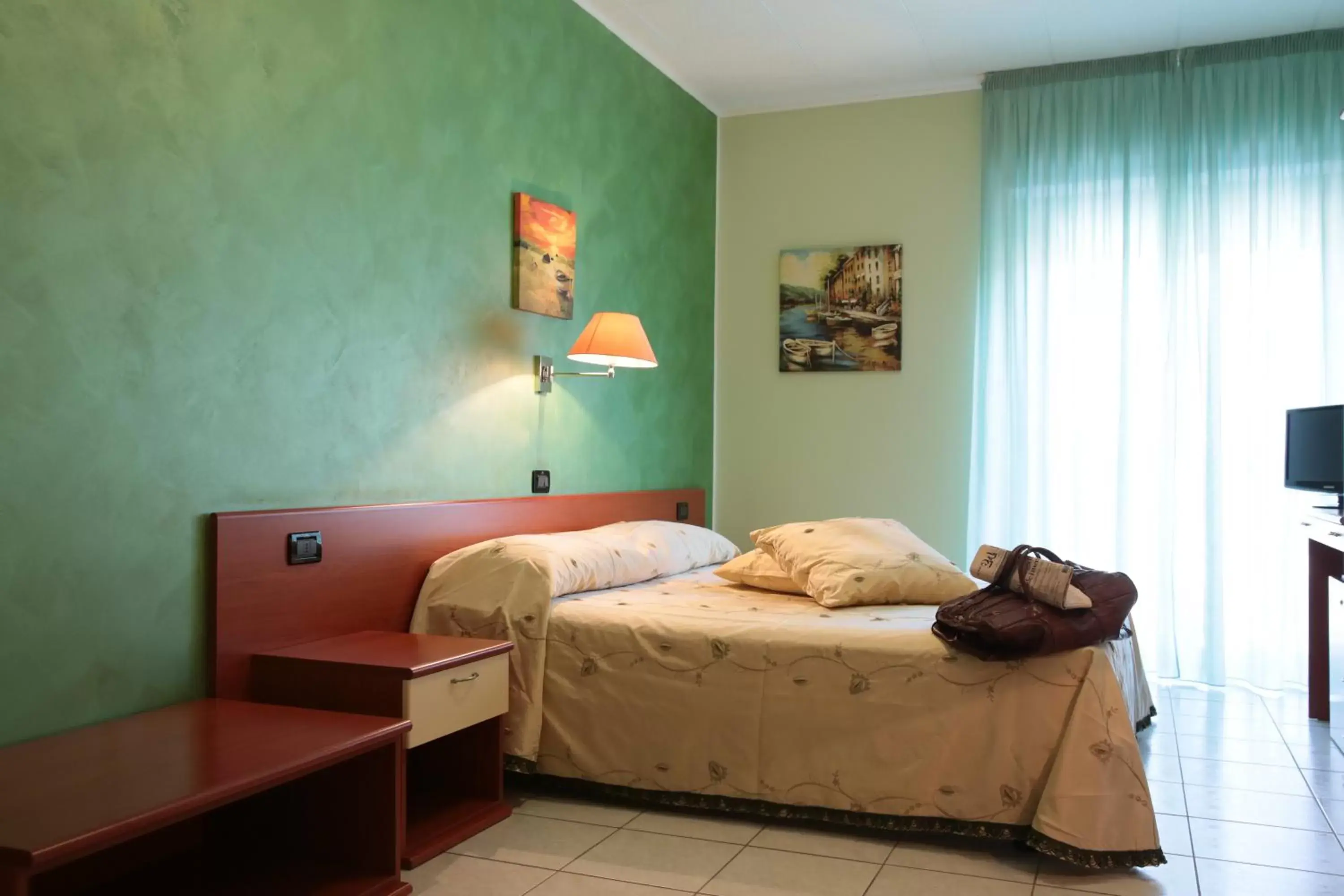 Bed, Room Photo in Hotel Leon - Ristorante Al Cavallino Rosso