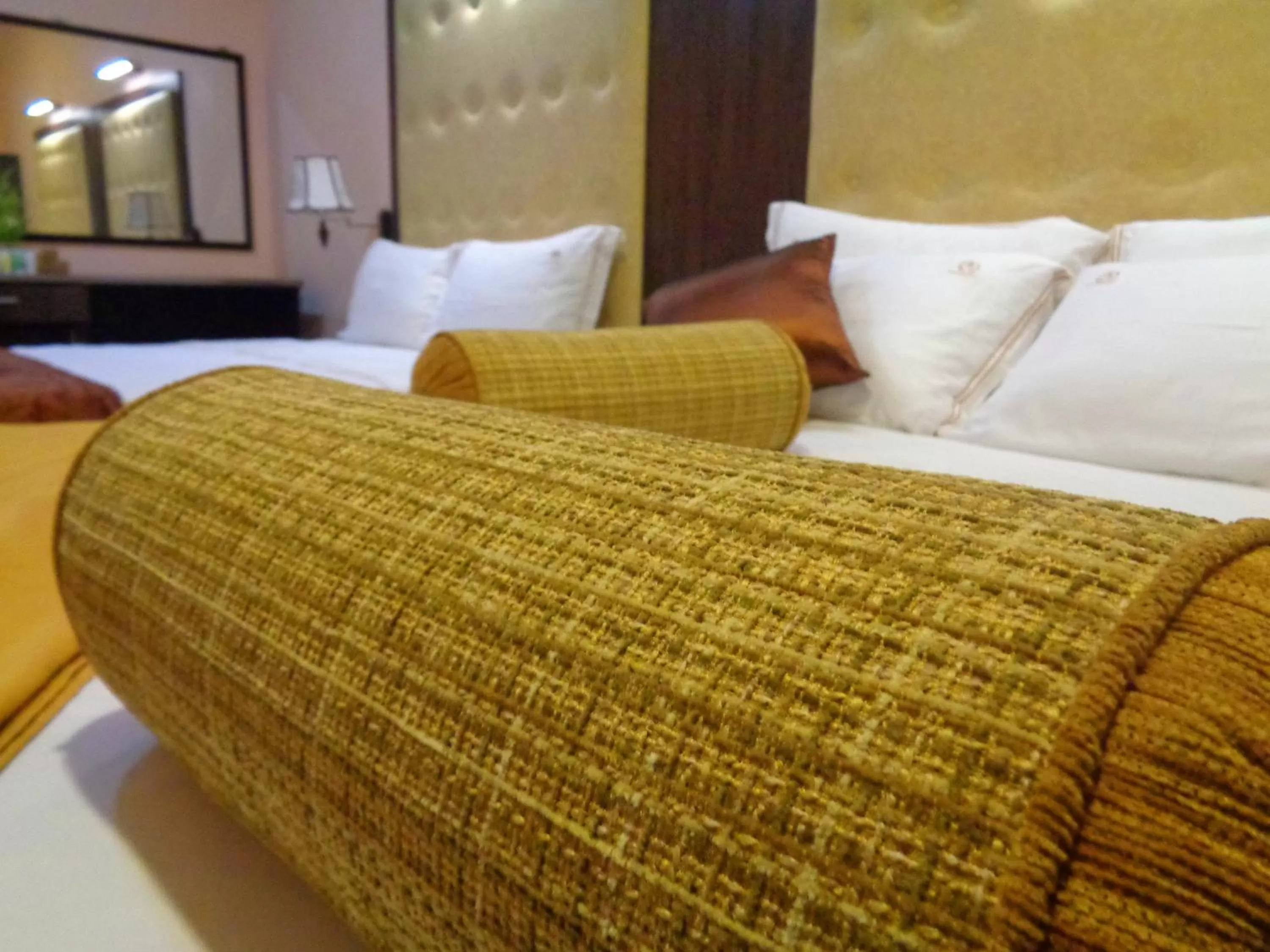 Bed in The Queensburry City Hotel