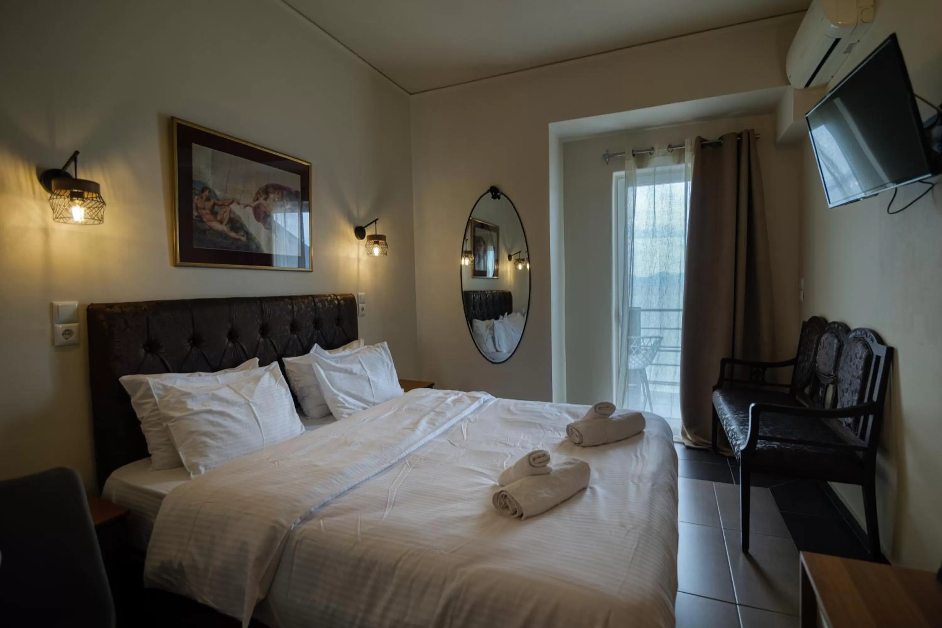 Bed in Votsalakia Hotel & Luxury Apartments