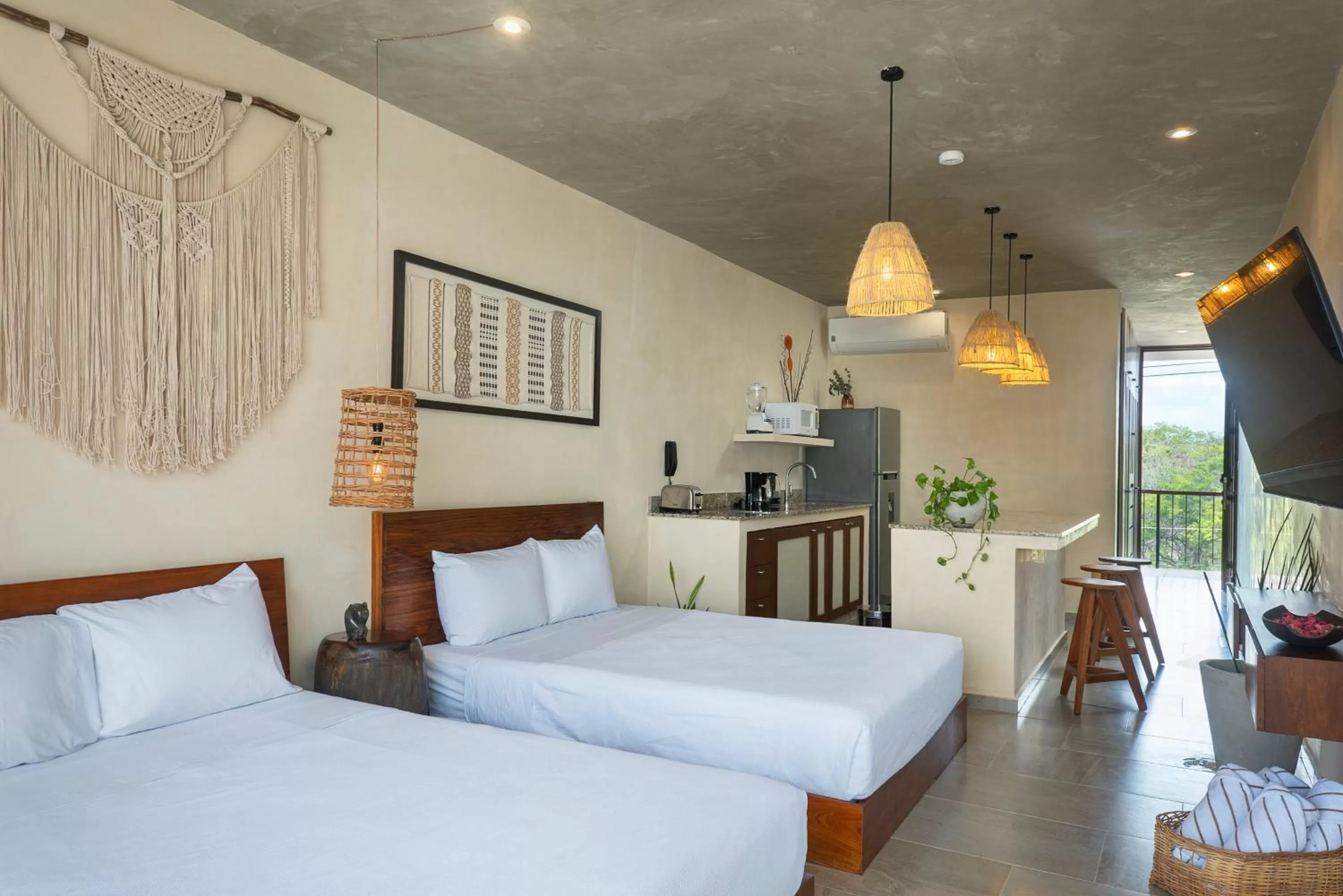 Bed in ARUNA TULUM-Luxury Studios & Apartments