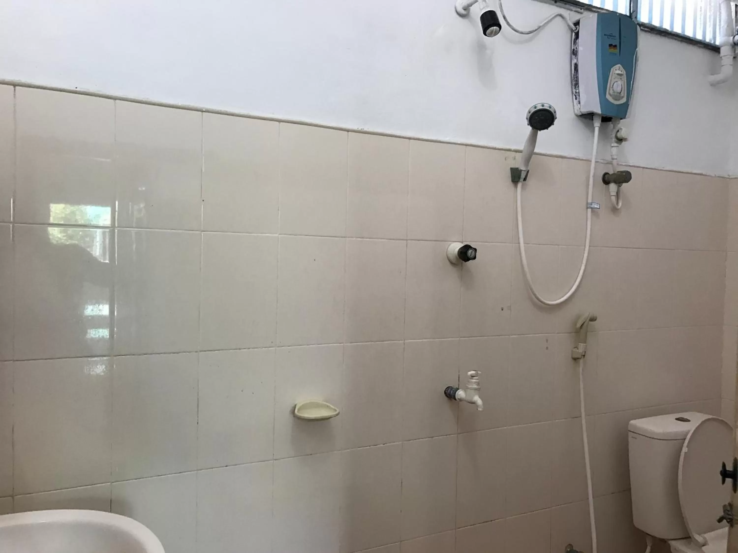 Bathroom in Gnaanams Hotel and Restaurant